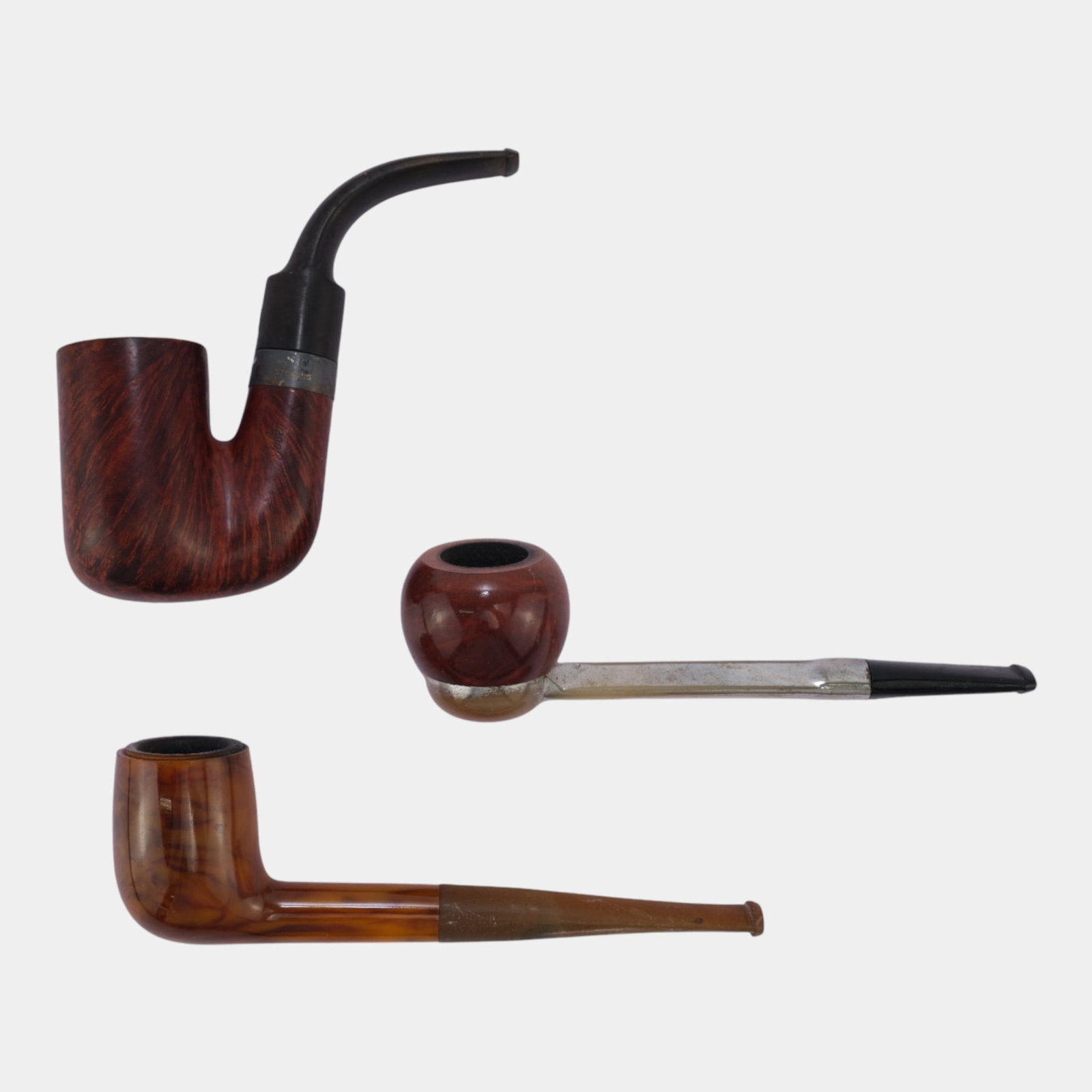 Jobey Sterling Extra Oom Paul, Belgian & Metal Falcon Briar Smoking Pipes: We offer affordable in-house shipping on all items. Jobey Sterling Extra Oom Paul, Belgian & Metal Falcon Briar Smoking Pipes Condition as shown. Largest pipe is 4" tall and 3 1/2" wide.