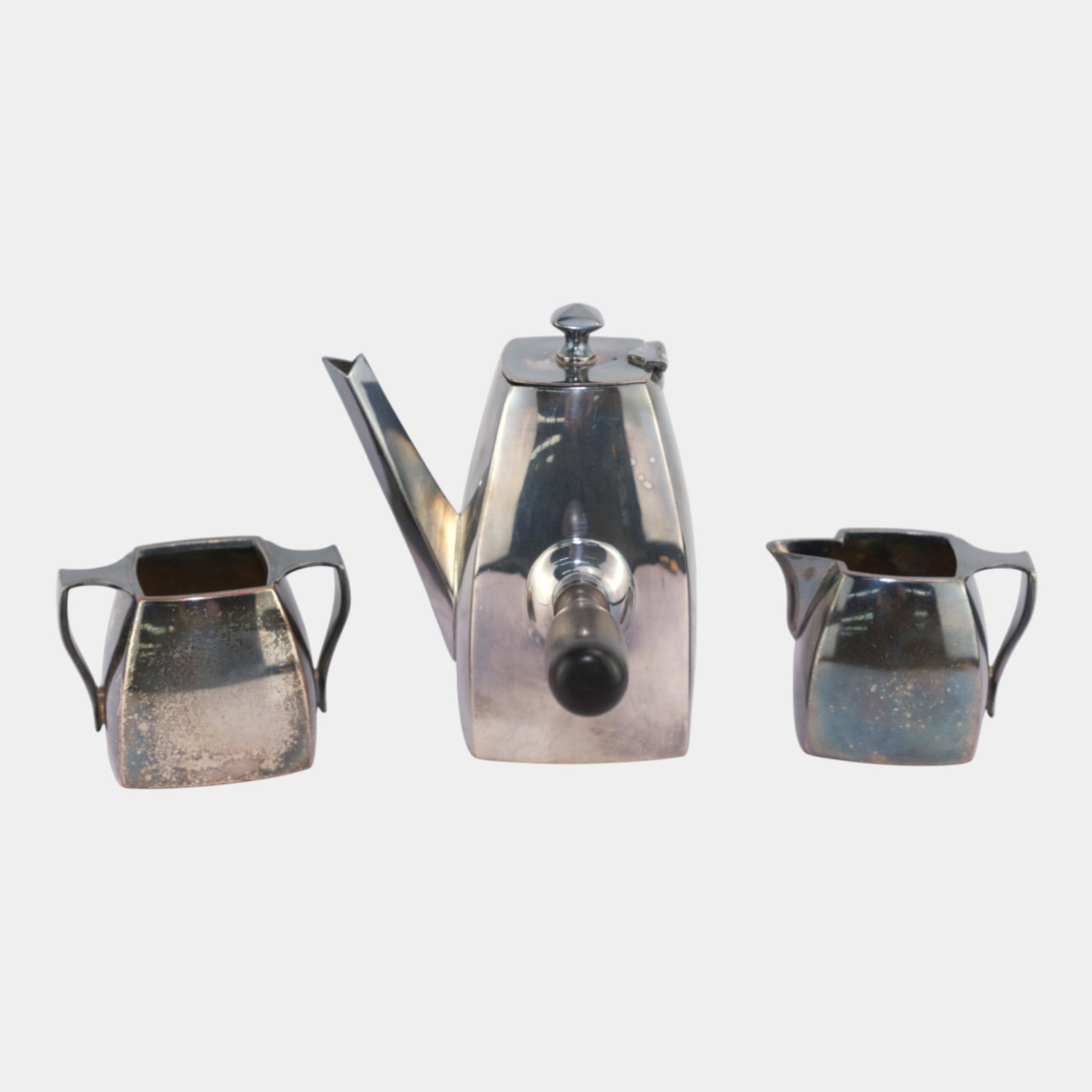 Art Deco 1930s Silver Plate Black Side Handled Teapot With Creamer & Sugar Bowl: We offer affordable in-house shipping on all items. Art Deco 1930s Silver Plate Black Side Handled Teapot With Creamer & Sugar Bowl Excellent condition. Age related wear. Tallest piece is 6" tall and 