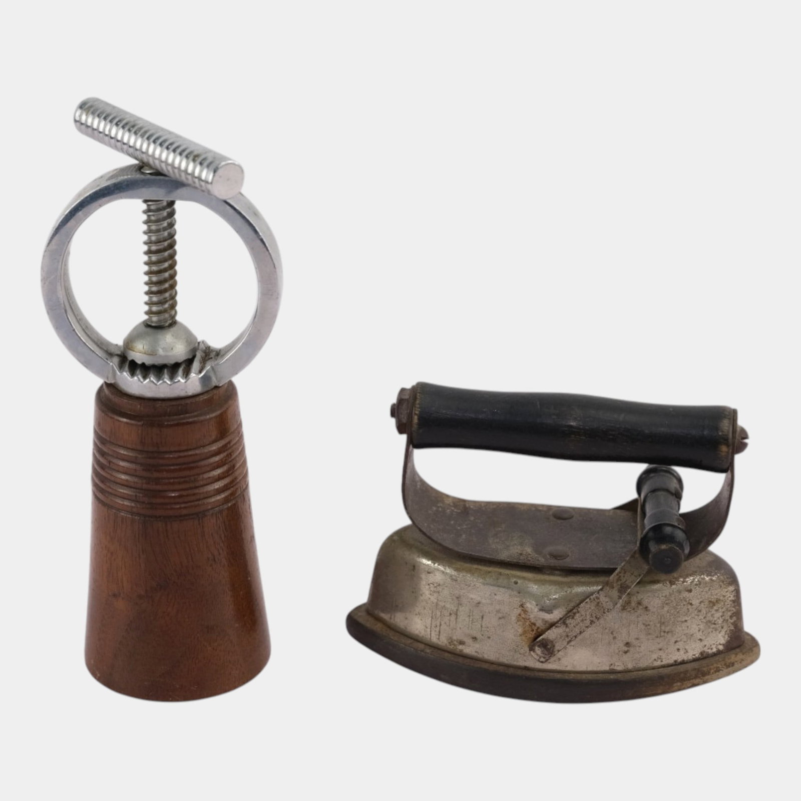 Antique Kitchen Tools Iron Press & Wood & Metal Nutcracker Set: We offer affordable in-house shipping on all items. Antique Kitchen Tools Iron Press & Wood & Metal Nutcracker Set Age related wear. Tallest is 5 1/2" tall and 2 1/2" wide.