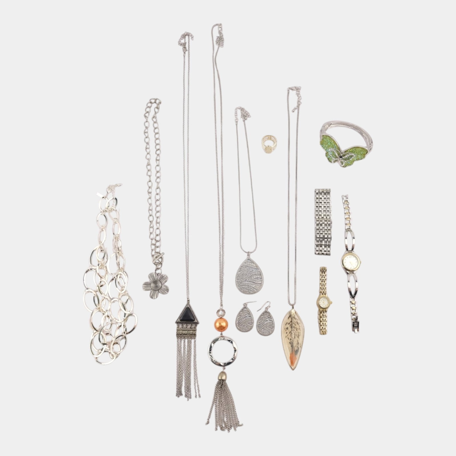 Kendra Scott, Daisy Fuentes, & Other Silver-Tone Costume Jewelry Necklaces, Watches, & Bracelet: We offer affordable in-house shipping on all items. Excellent condition. Age related wear. Longest necklace chain is 34 1/2" long.
