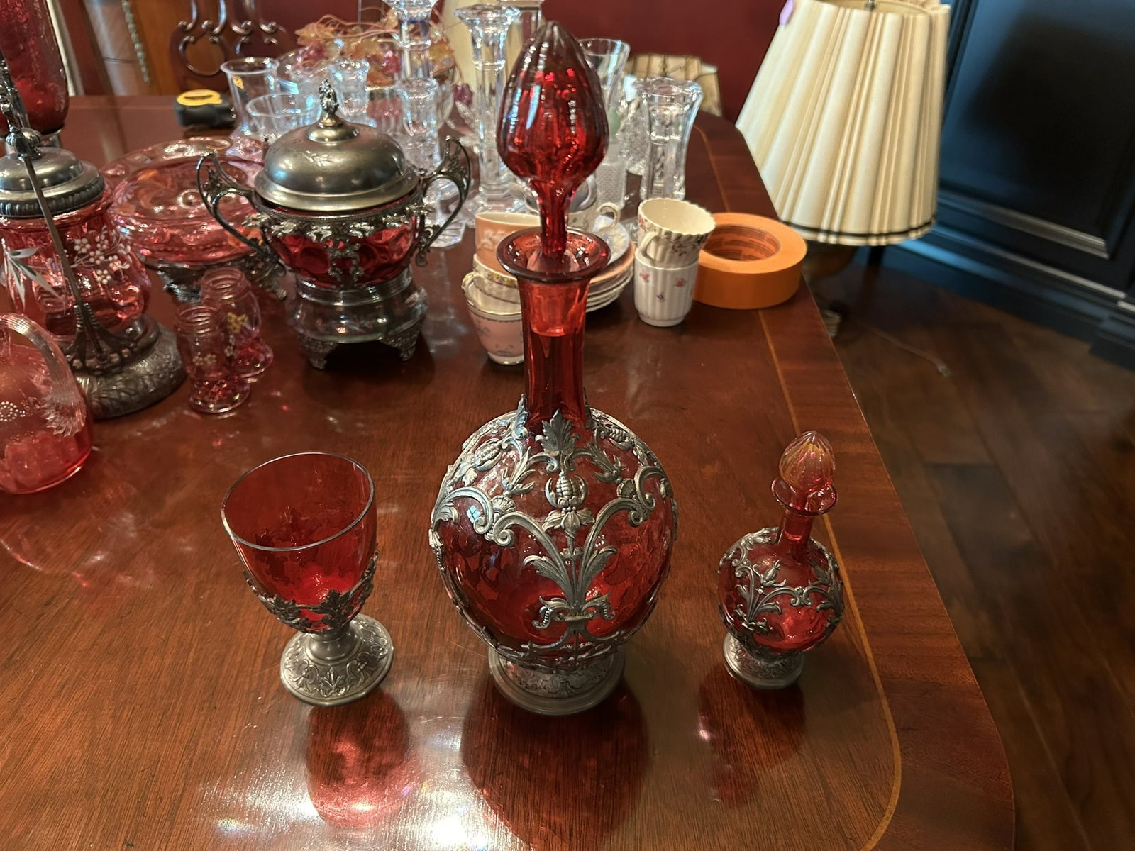 Vintage Cranberry Glass Silver-Tone Overlay Decanter Perfume Bottle And Goblet Group: We offer affordable in-house shipping on all items. Vintage Cranberry Glass Silver-Tone Overlay Decanter Perfume Bottle And Goblet Group Excellent condition. Age related wear. Decanter is 13 1/2" tall