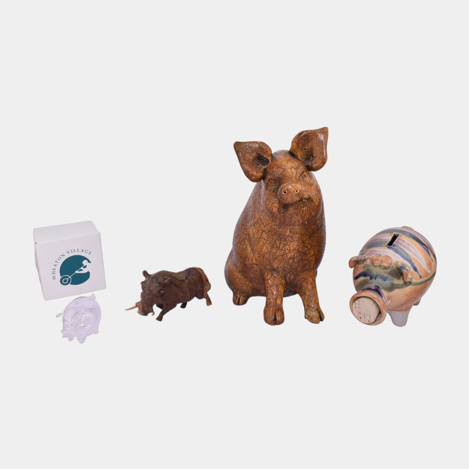 Assorted Wooden Glass Ceramic Folk Art Pig Banks Figurines: We offer affordable in-house shipping on all items.For higher resolution images please visit bid.craftedauctions.com Assorted Wooden Glass Ceramic Folk Art Pig Banks Figurines Excellent condition. No 