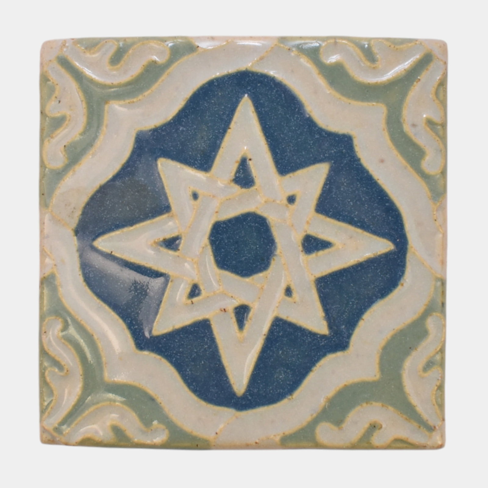Early 20th Century American Arts & Crafts White Geometric Star Motif Architectural Pottery Tile: We offer affordable in-house shipping on all items.For higher resolution images please visit bid.craftedauctions.com Early 20th Century American Arts & Crafts White Geometric Star Motif Architectural 