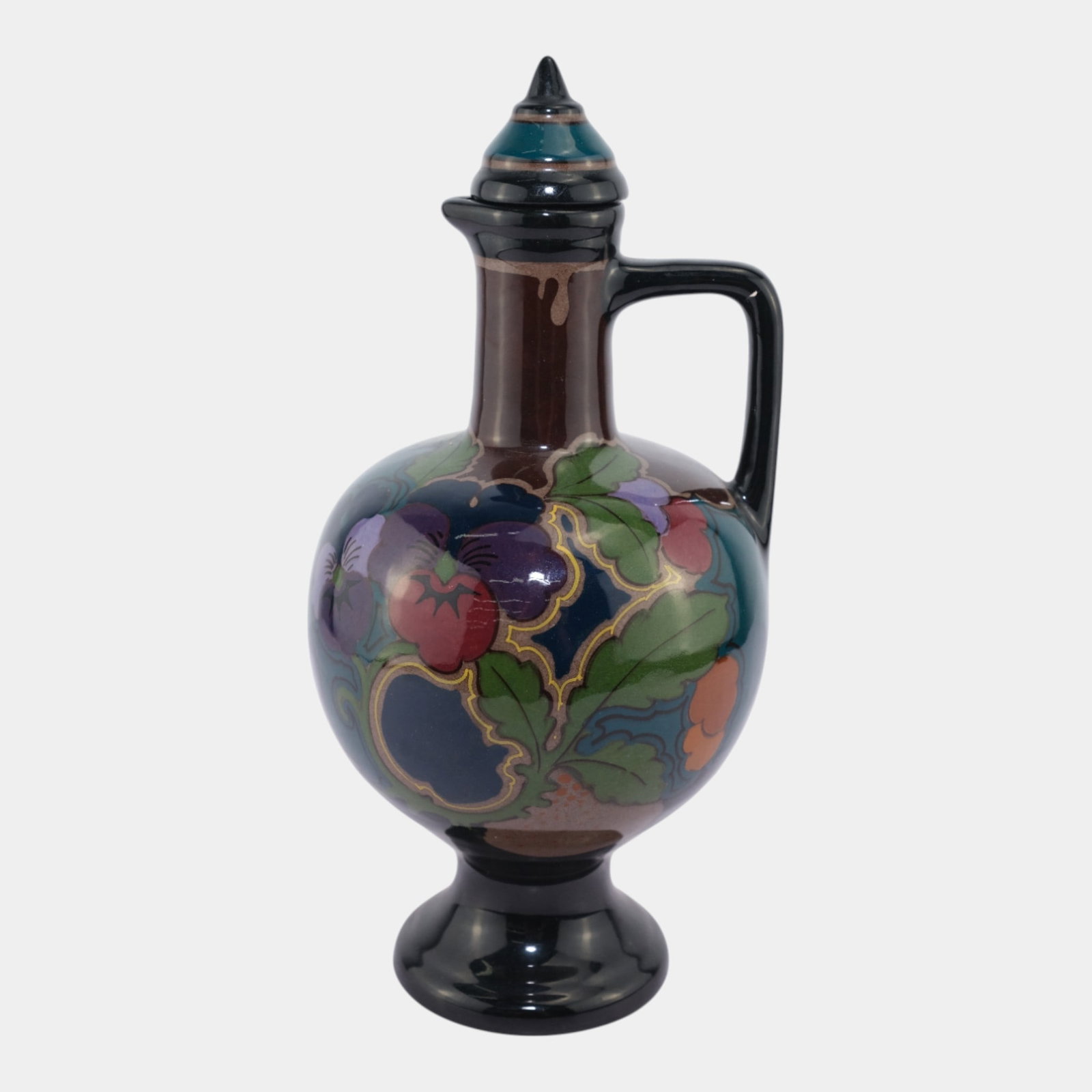 Gouda Pottery Holland 1930s Plateelfabriek Ivora Art Deco Floral Lidded Jug: We offer affordable in-house shipping on all items.For higher resolution images please visit bid.craftedauctions.com Gouda Pottery Holland 1930s Plateelfabriek Ivora Art Deco Floral Lidded Jug Strikin