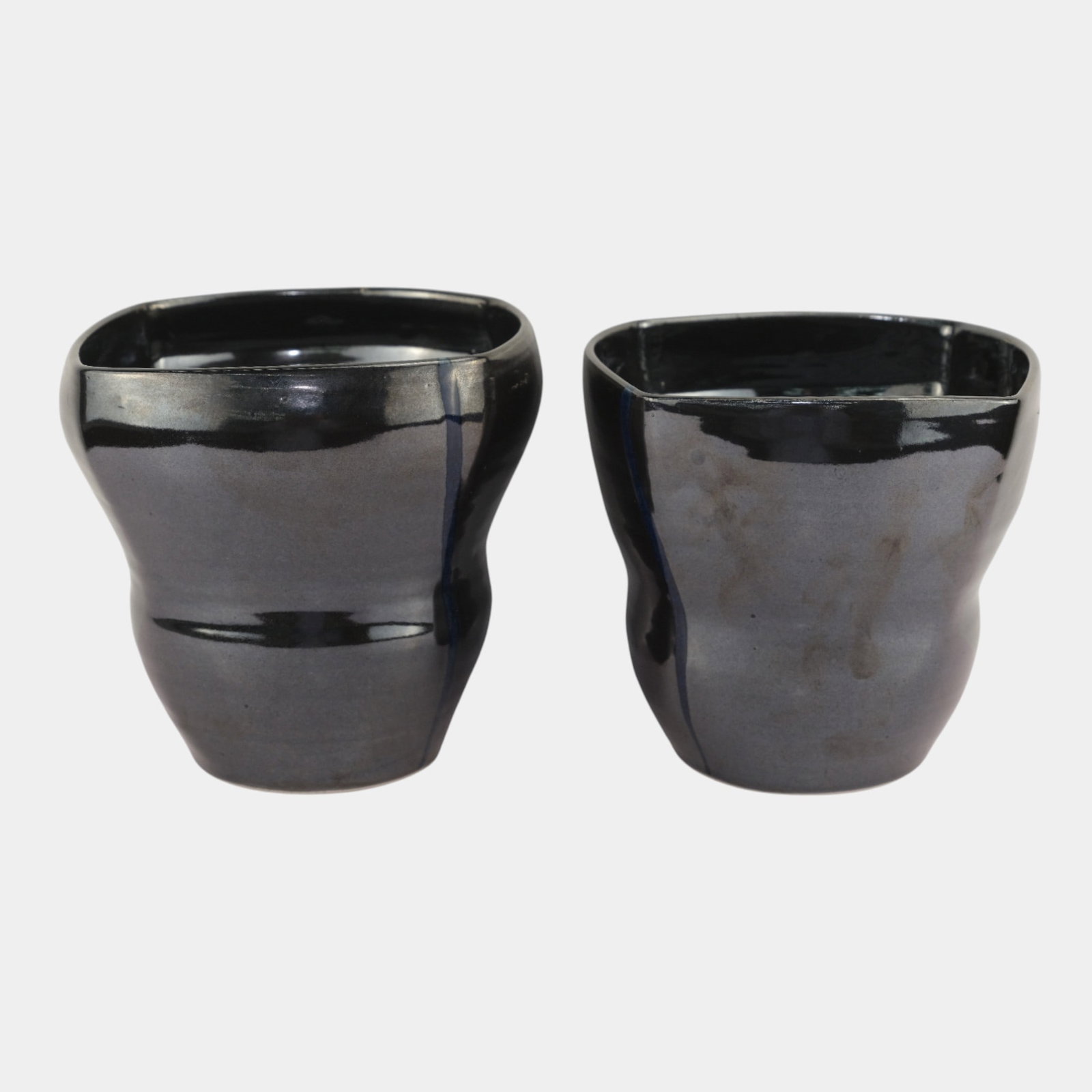 William "Bill" Kremer Studio Pottery Black Mid Century Modern Stepped Vases: We offer affordable in-house shipping on all items.For higher resolution images please visit bid.craftedauctions.com William "Bill" Kremer Studio Pottery Black Mid Century Modern Stepped Vases Boldly 