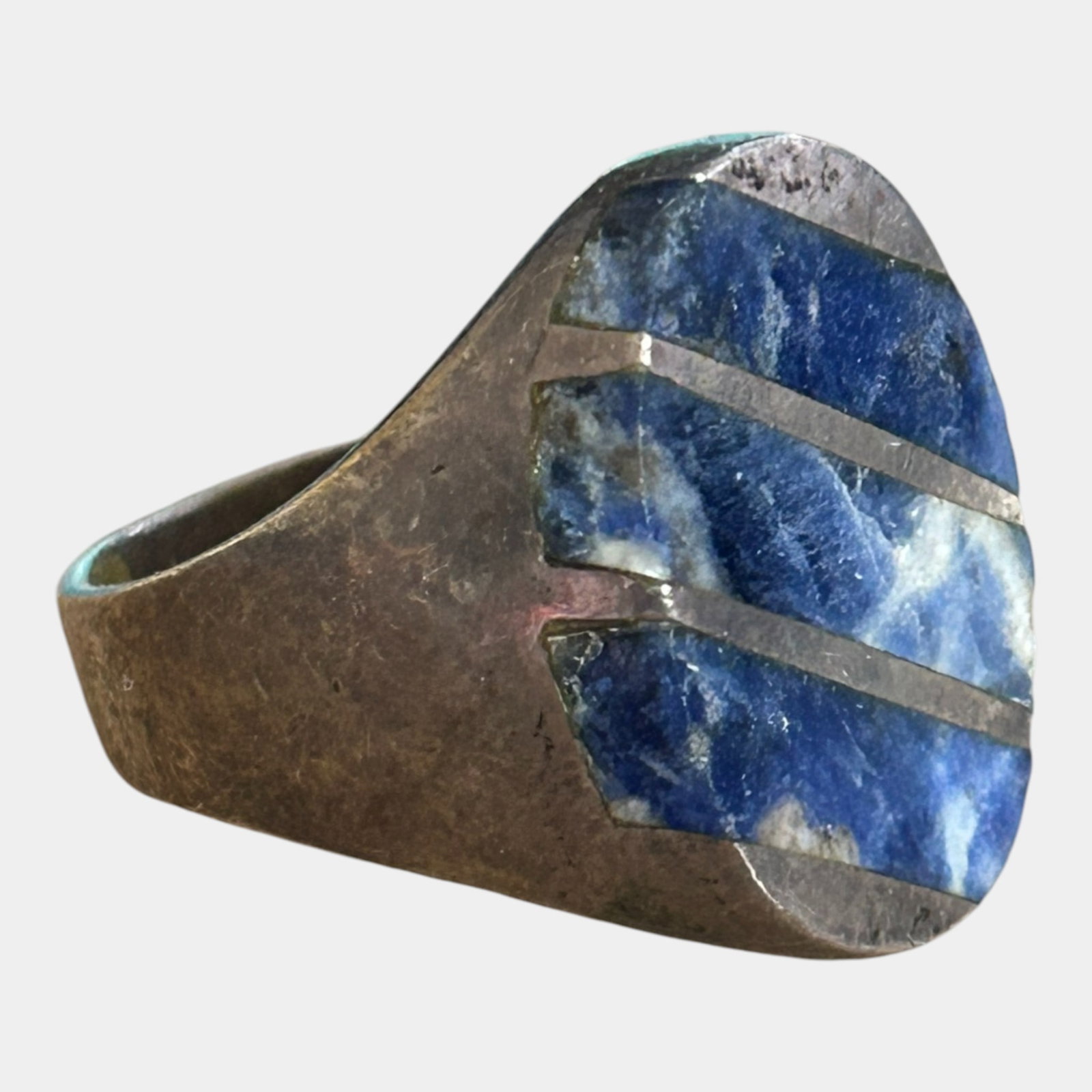 Sterling Silver & Lapis Lazuli Inlay Mid Century Modern Statement Ring Size 9.5: We offer affordable in-house shipping on all items.For higher resolution images please visit bid.craftedauctions.com This modernist sterling silver ring features bold lapis lazuli inlay segmented by s