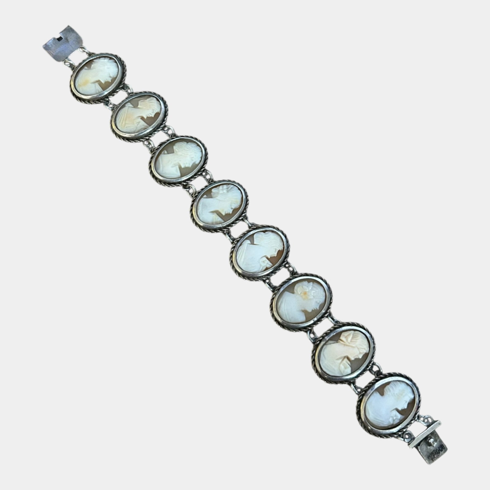 Victorian 19th Century 800 Silver With 8 Different Shell Carved Cameos 7" Long Bracelet: We offer affordable in-house shipping on all items.For higher resolution images please visit bid.craftedauctions.com Victorian 19th Century 800 Silver With 8 Different Shell Carved Cameos 7" Long Brac