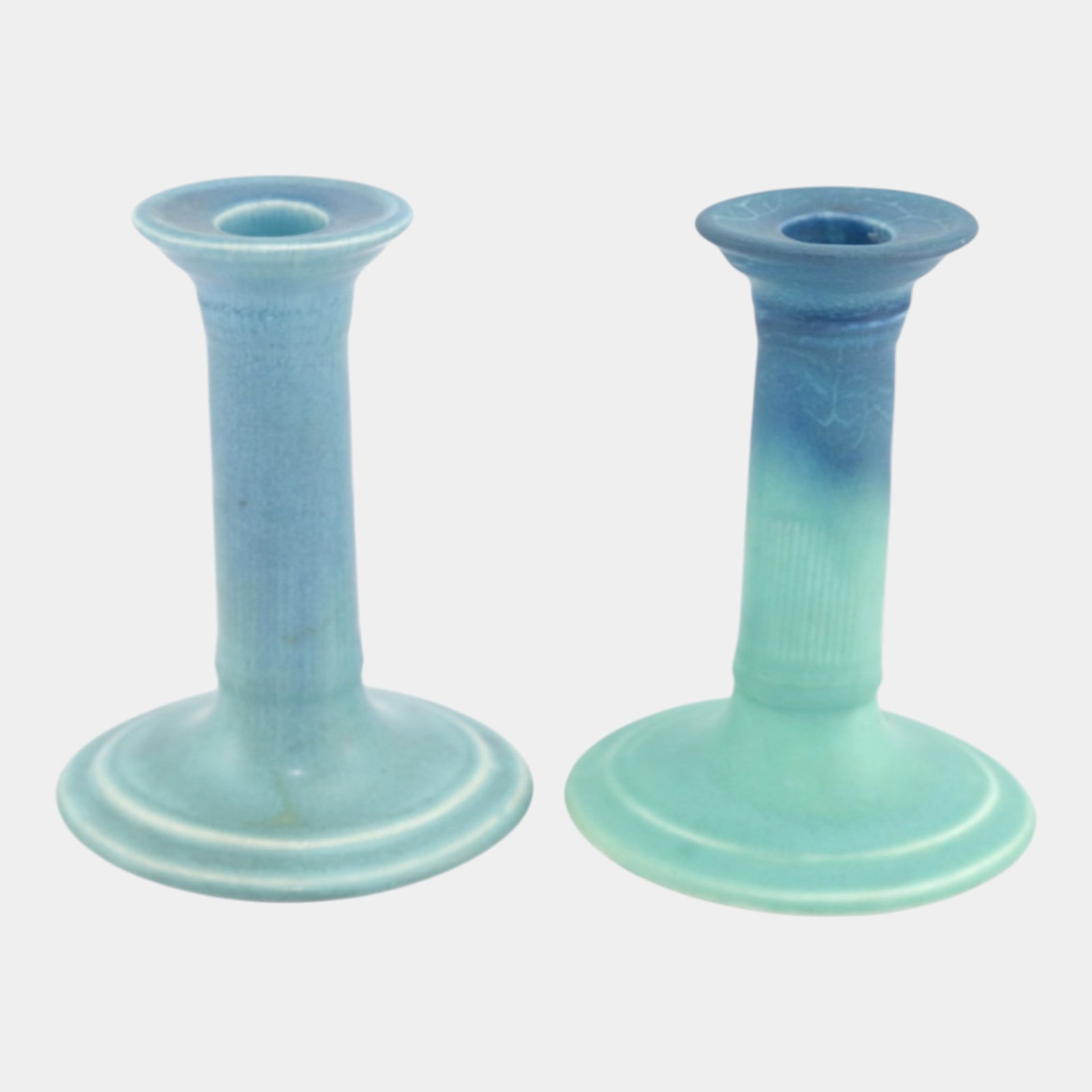 Rookwood 1906 & 1920 Vintage Art Pottery Blue Ceramic Footed Candle Holders 508: We offer affordable in-house shipping on all items.For higher resolution images please visit bid.craftedauctions.com Rookwood 1906 & 1920 Vintage Art Pottery Blue Ceramic Footed Candle Holders 508 Nic
