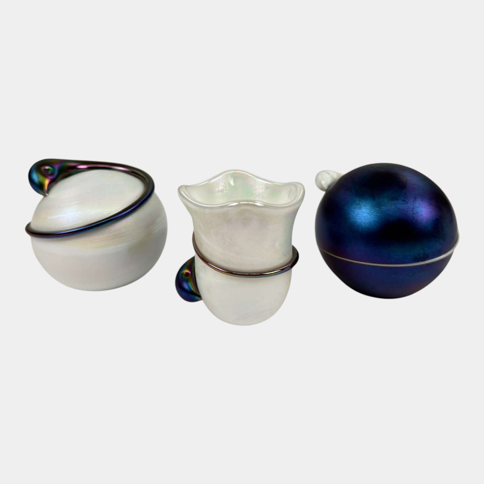 Terry Crider Ohio Studio Art Glass Blue Iridescent And White Applied Snake Paperweights With Vase: We offer affordable in-house shipping on all items.For higher resolution images please visit bid.craftedauctions.com Terry Crider Ohio Studio Art Glass Blue Iridescent And White Applied Snake Paperwei