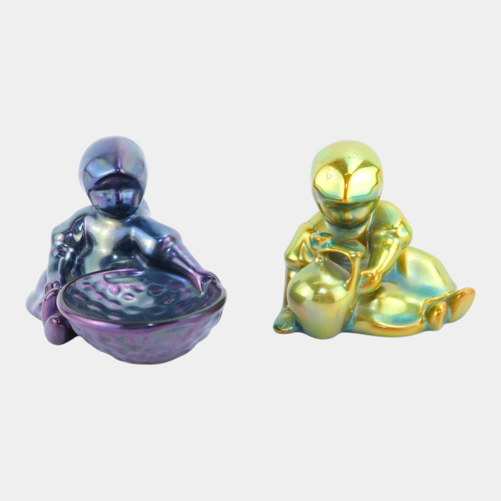 Zsolnay Eosin Hungarian 20th Century Green & Purple Iridescent Sitting Gril Figurine And Figural: Professional, fast, and affordable in house shipping available for all items.For higher resolution images please visit www.bid.craftedauctions.com Zsolnay Eosin Hungarian 20th Century Green & Purple I