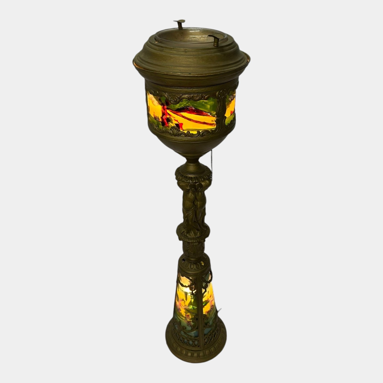 Early 20th Century Brass And Reverse Painted Glass Panel Electric Lighted Lobby Ashtray Stand: Professional, fast, and affordable in house shipping available for all items.For higher resolution images please visit www.bid.craftedauctions.com Early 20th Century Brass And Reverse Painted Glass Pa
