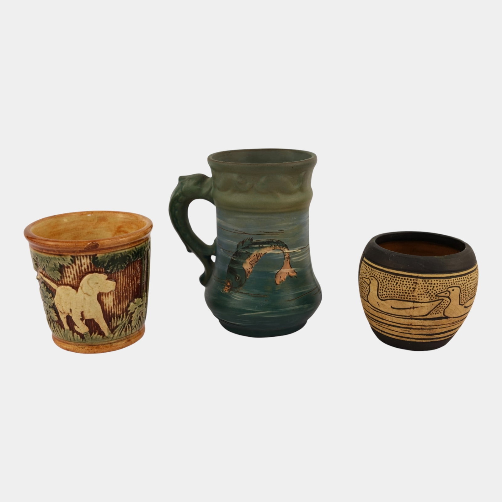 Weller Dickensware Claywood Knifewood Pottery Vases Mug: Professional, fast, and affordable in house shipping available for all items.For higher resolution images please visit www.bid.craftedauctions.com Weller Dickensware Claywood Knifewood Pottery Vases M
