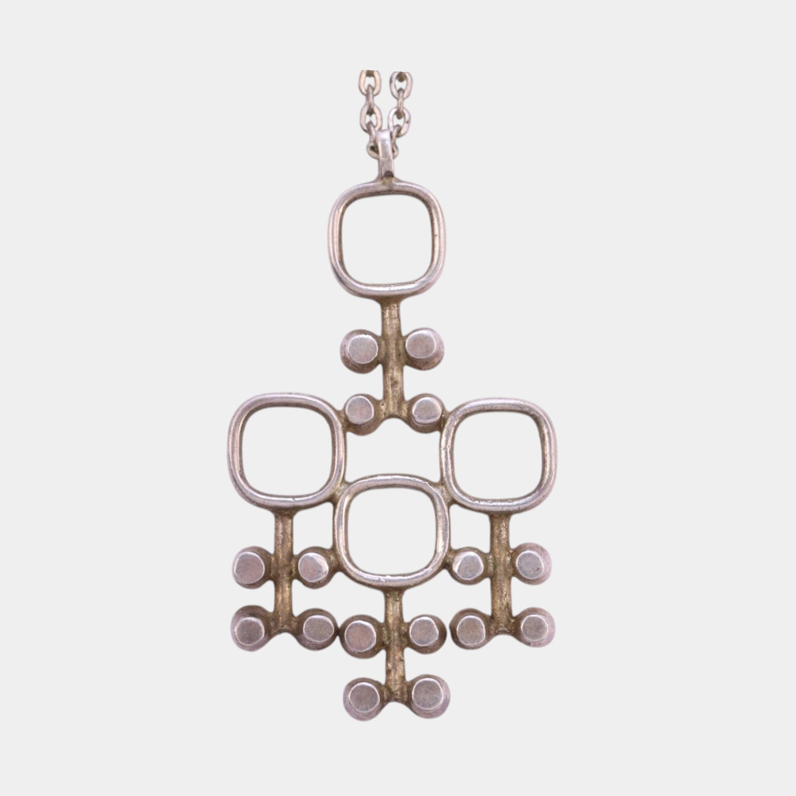 Jorma Laine (Finland, 1930-2002) For Kultateollisuus KY 830 Silver Mid Century Modern Necklace And: Professional, fast, and affordable in house shipping available for all items.For higher resolution images please visit www.bid.craftedauctions.com Boldly geometric, this Jorma Laine for Kultateollisuu