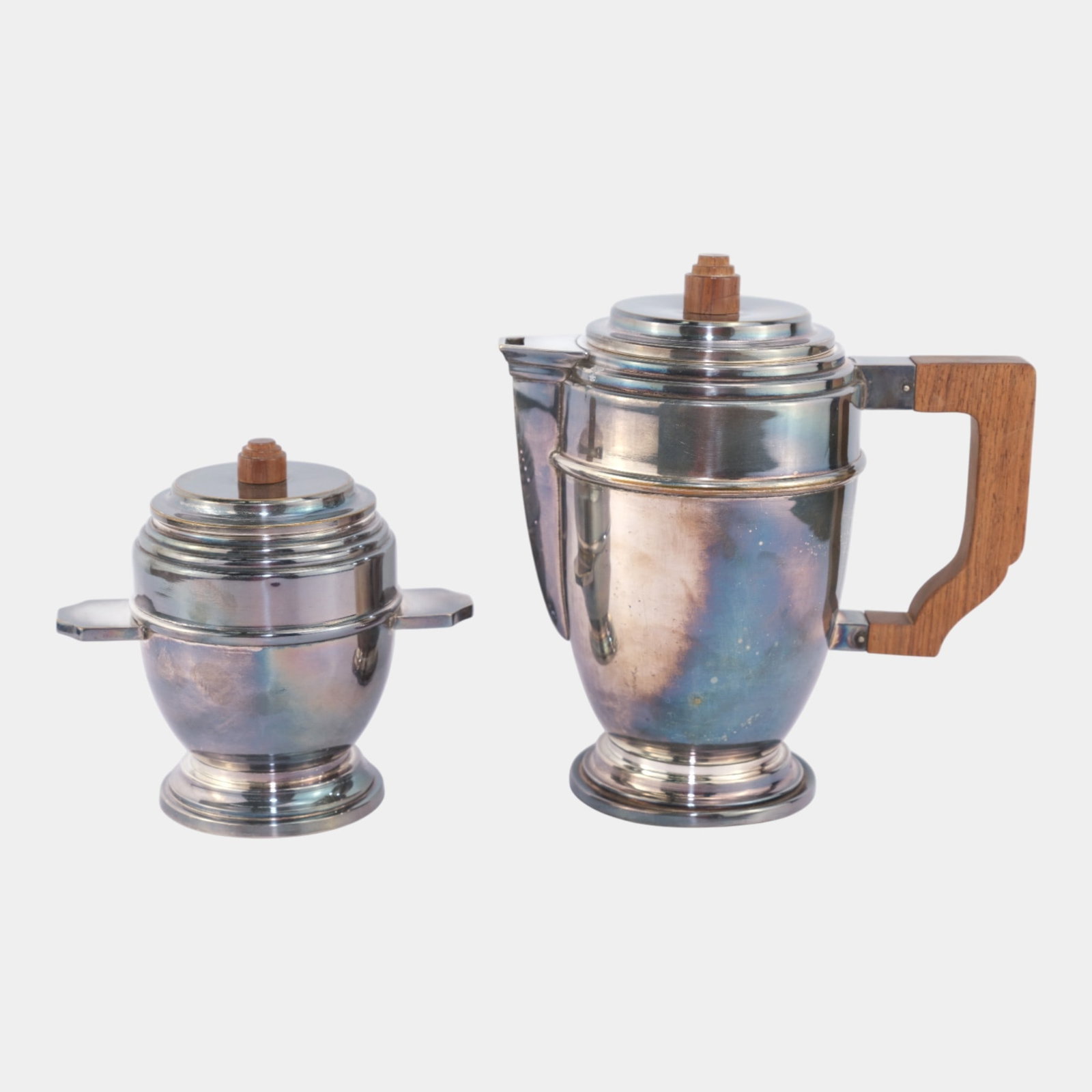 Art Deco 1930s Chrome And Wood Handled Streamlined Stepped Design Tea Set: Professional, fast, and affordable in house shipping available for all items.For higher resolution images please visit www.bid.craftedauctions.com Art Deco 1930s Chrome And Wood Handled Streamlined St