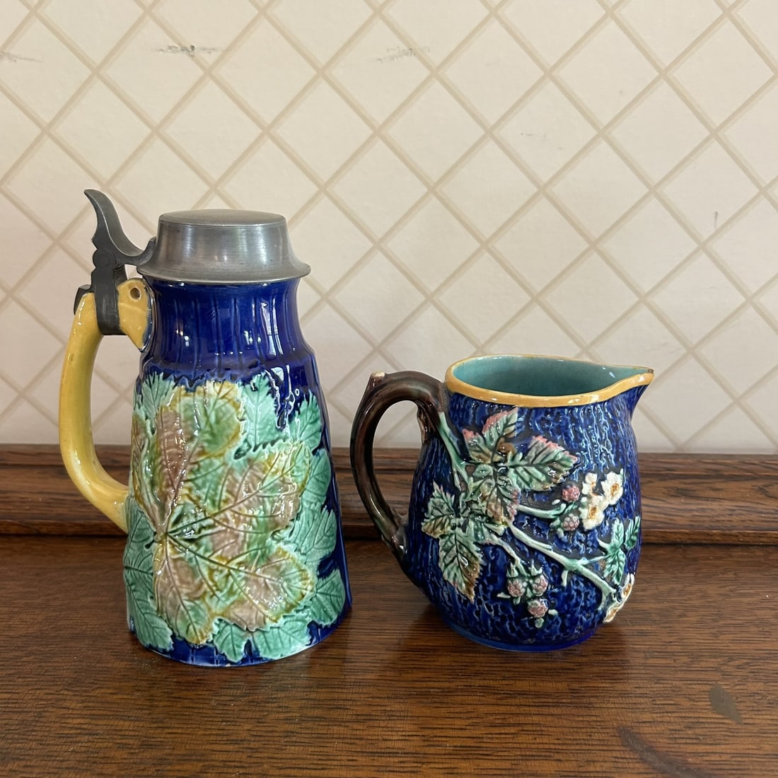 Wedgwood Late 1800s Blue Green Blackberry Branch Majolica Pitcher & Other Majolica Lidded Tankard: Professional, fast, and affordable in house shipping available for all items.For higher resolution images please visit www.bid.craftedauctions.com Wedgwood Late 1800s Blue Green Blackberry Branch Majo