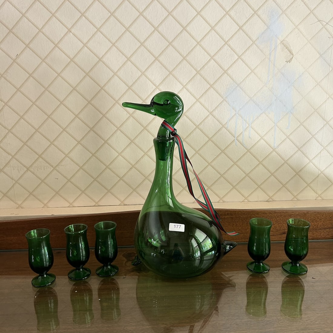 Gio Ponti For Empoli Green Mid Century Modern Green Glass Figural Duck Decanter With Stemware: Professional, fast, and affordable in house shipping available for all items.For higher resolution images please visit www.bid.craftedauctions.com Gio Ponti For Empoli Green Mid Century Modern Green G
