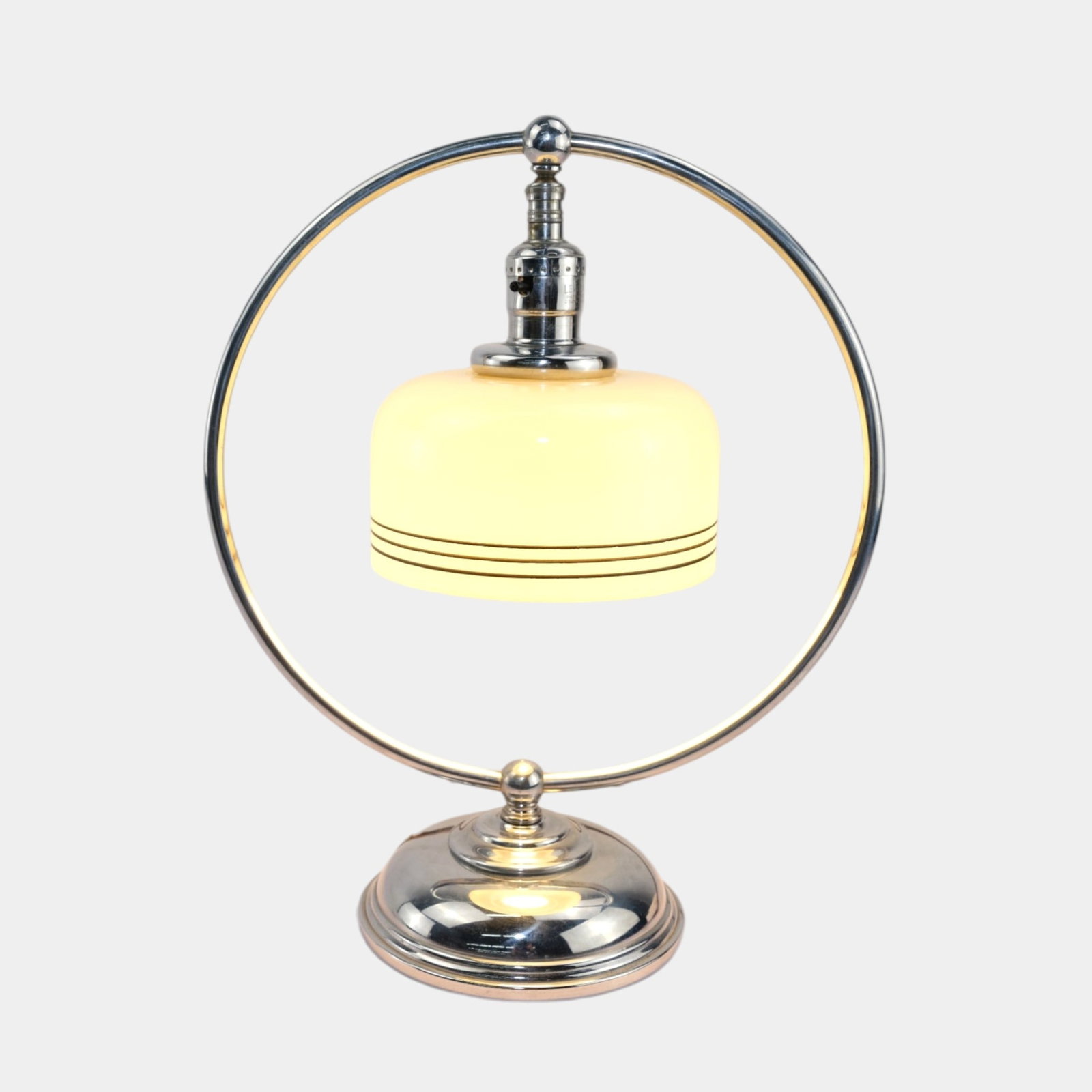 Chase 1930s Art Deco Chrome And Milk Glass Shade Loop Design Electric Table Lamp: Professional, fast, and affordable in house shipping available for all items.For higher resolution images please visit www.bid.craftedauctions.com Chase 1930s Art Deco Chrome And Milk Glass Shade Loop