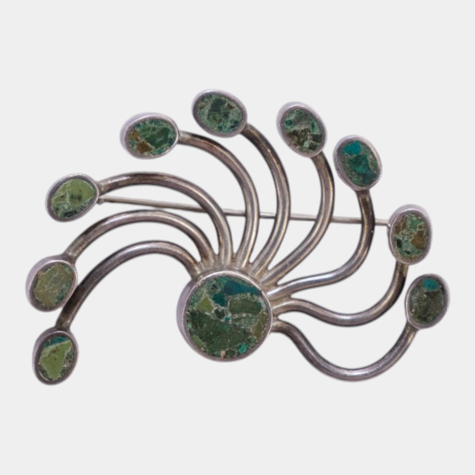 Miguel Melendez For Taxco Mexico 1940s Sterling Silver 925 Modernist Green Tentacle Brooch: Professional, fast, and affordable in house shipping available for all items.For higher resolution images please visit www.bid.craftedauctions.com Boldly sculptural and distinctly modernist, this Migu