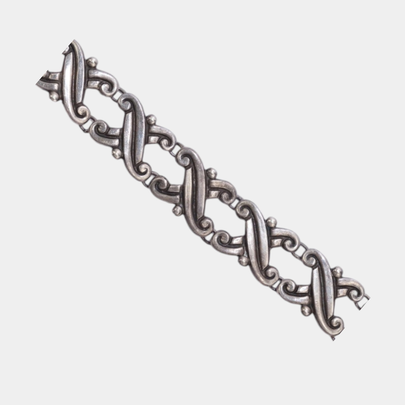 Gerardo Lopez For Taxco Sterling Silver 925 Mid Century Modernist Crossover Pattern Link Bracelet: Professional, fast, and affordable in house shipping available for all items.For higher resolution images please visit www.bid.craftedauctions.com Elegantly sculptural and distinctly modernist, this G
