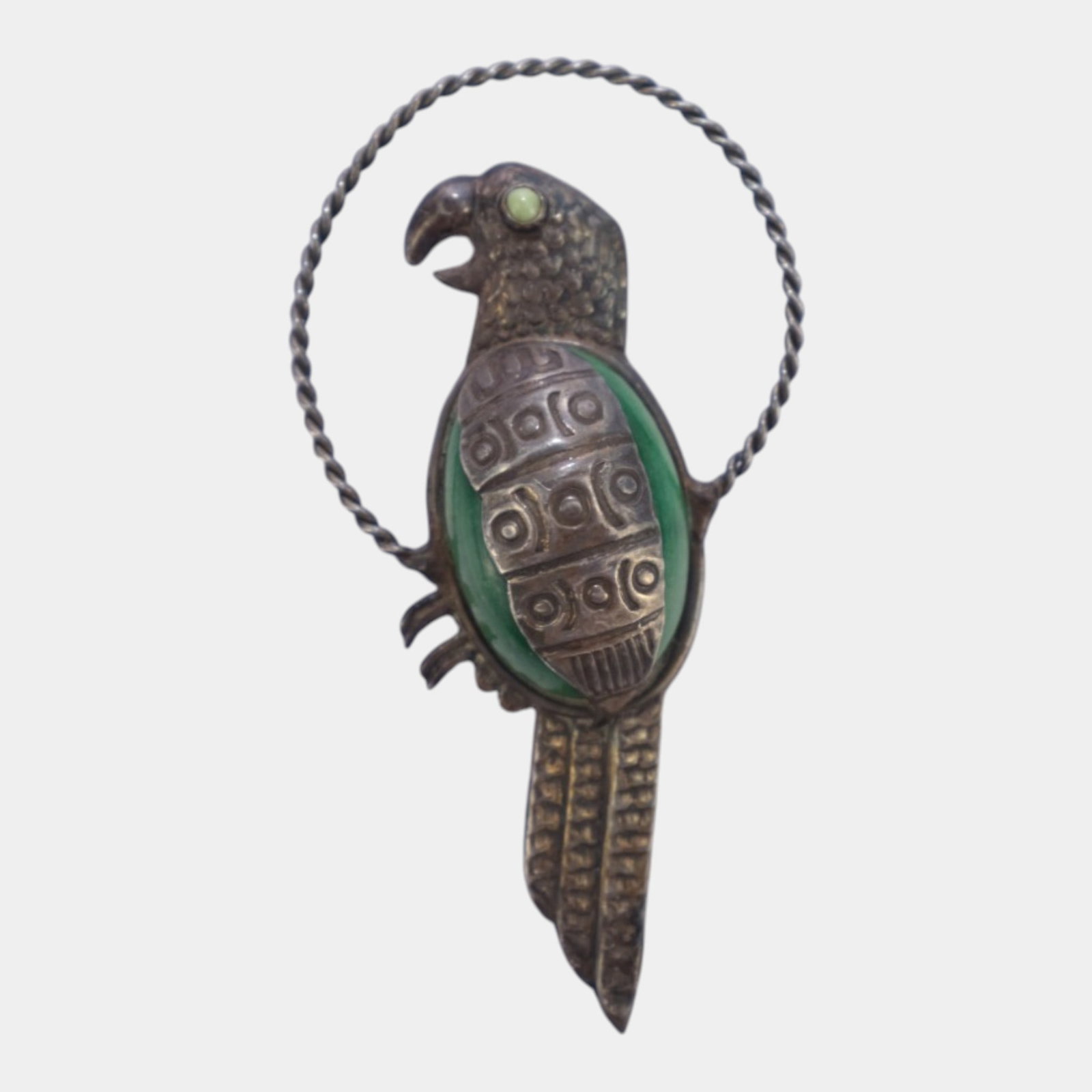 Mexican Sterling Silver 1940s Mid Century Figural Bird Brooch Pin With Twisted Wire Hoop Design: Professional, fast, and affordable in house shipping available for all items.For higher resolution images please visit www.bid.craftedauctions.com Boldly handcrafted and distinctly folk art inspired, 