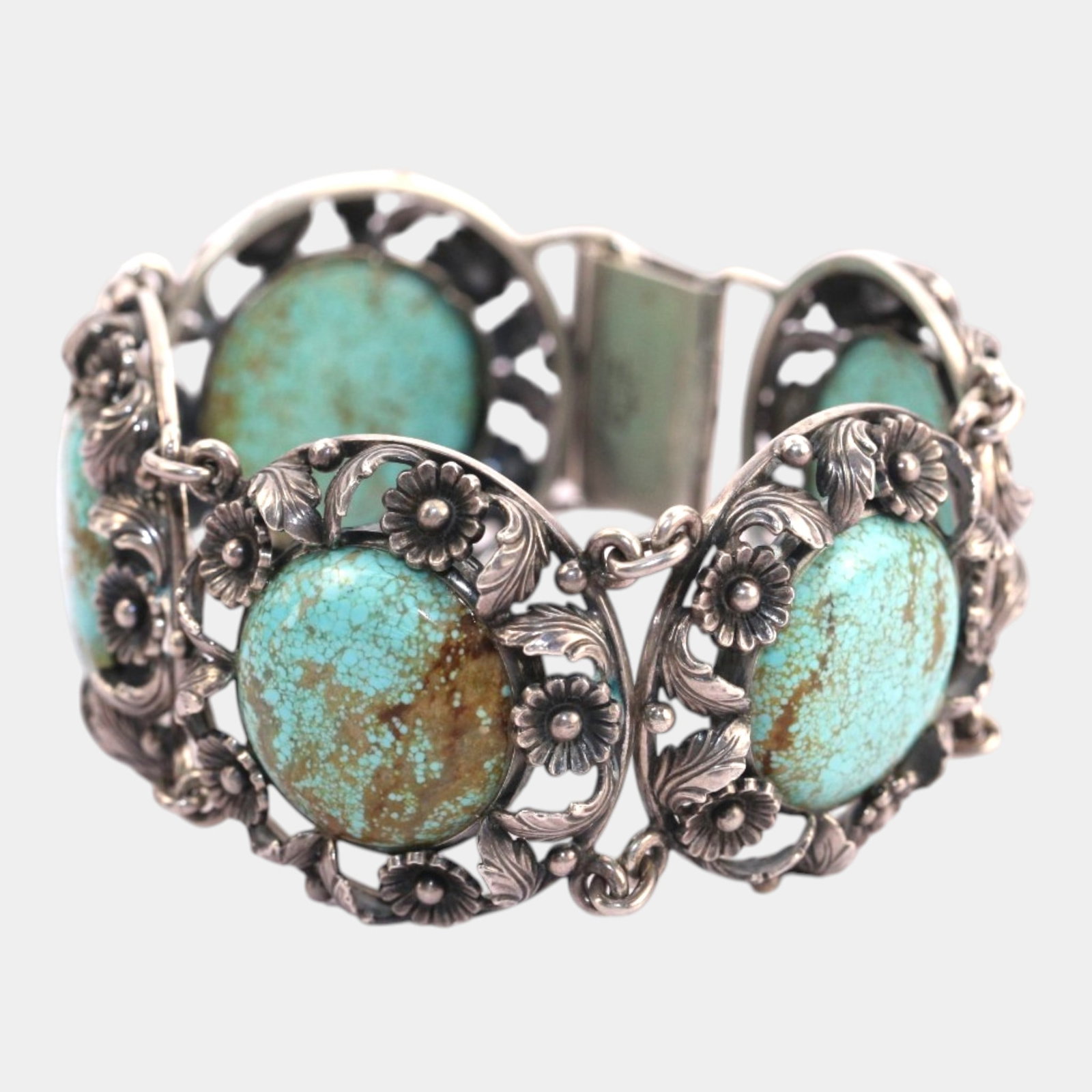 Neils Erik From Danish Mid Century Modern Sterling Silver Turquoise Cabochon Link Bracelet: Professional, fast, and affordable in house shipping available for all items.For higher resolution images please visit www.bid.craftedauctions.com Richly detailed and boldly Southwestern, this vintage