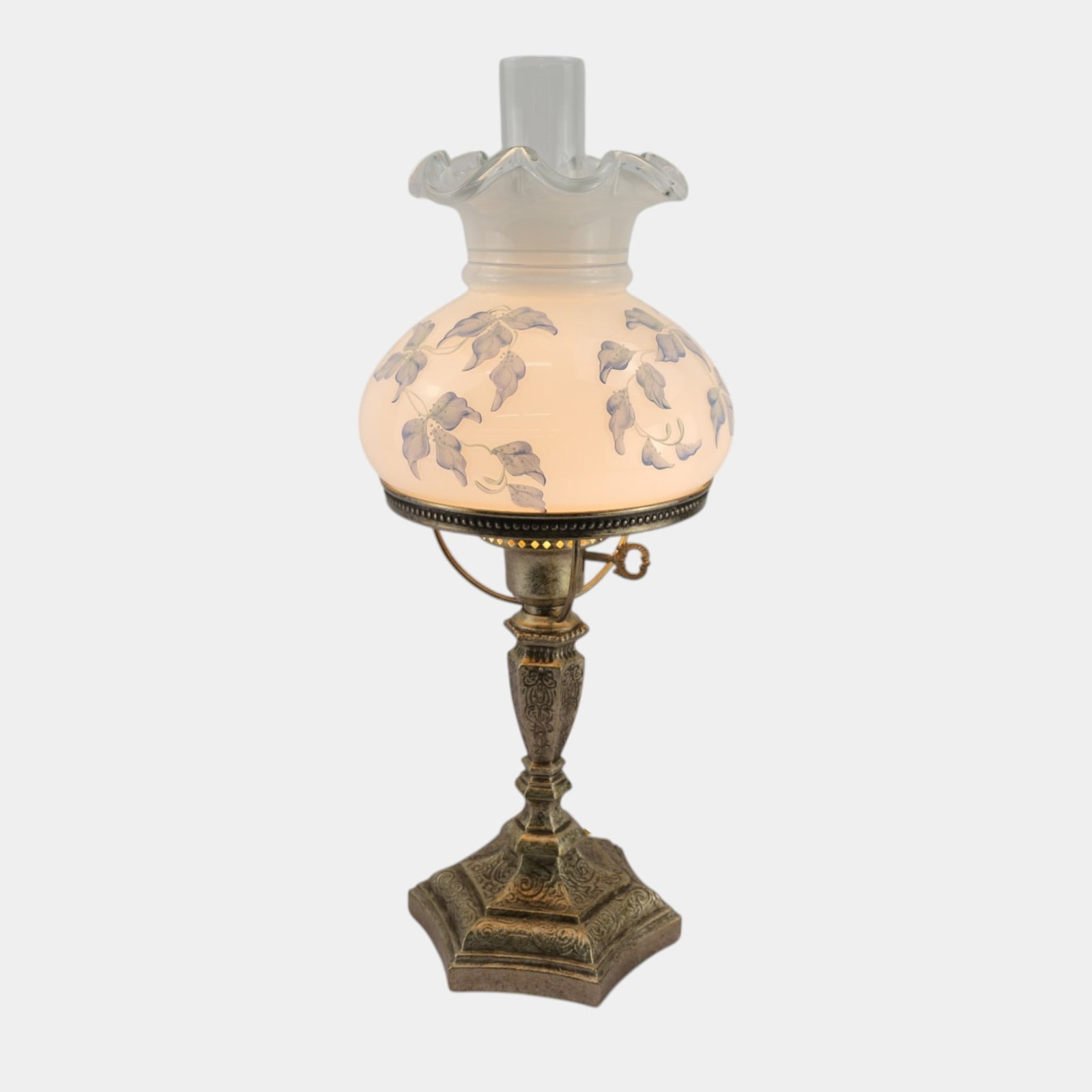 Vicki Williams For Fenton White Blue Hand Painted Floral Motif Glass Shade & Metal Lamp Base: Professional, fast, and affordable in house shipping available for all items.For higher resolution images please visit www.bid.craftedauctions.com Vicki Williams For Fenton White Blue Hand Painted Flo