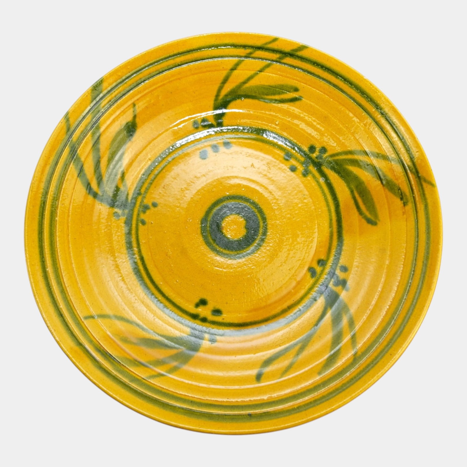 Betty Woodman Studio Art Pottery Yellow And Green Botanical Modernist 16" Diameter Charger: Professional, fast, and affordable in house shipping available for all items.For higher resolution images please visit www.bid.craftedauctions.com Betty Woodman Studio Art Pottery Yellow And Green Bot