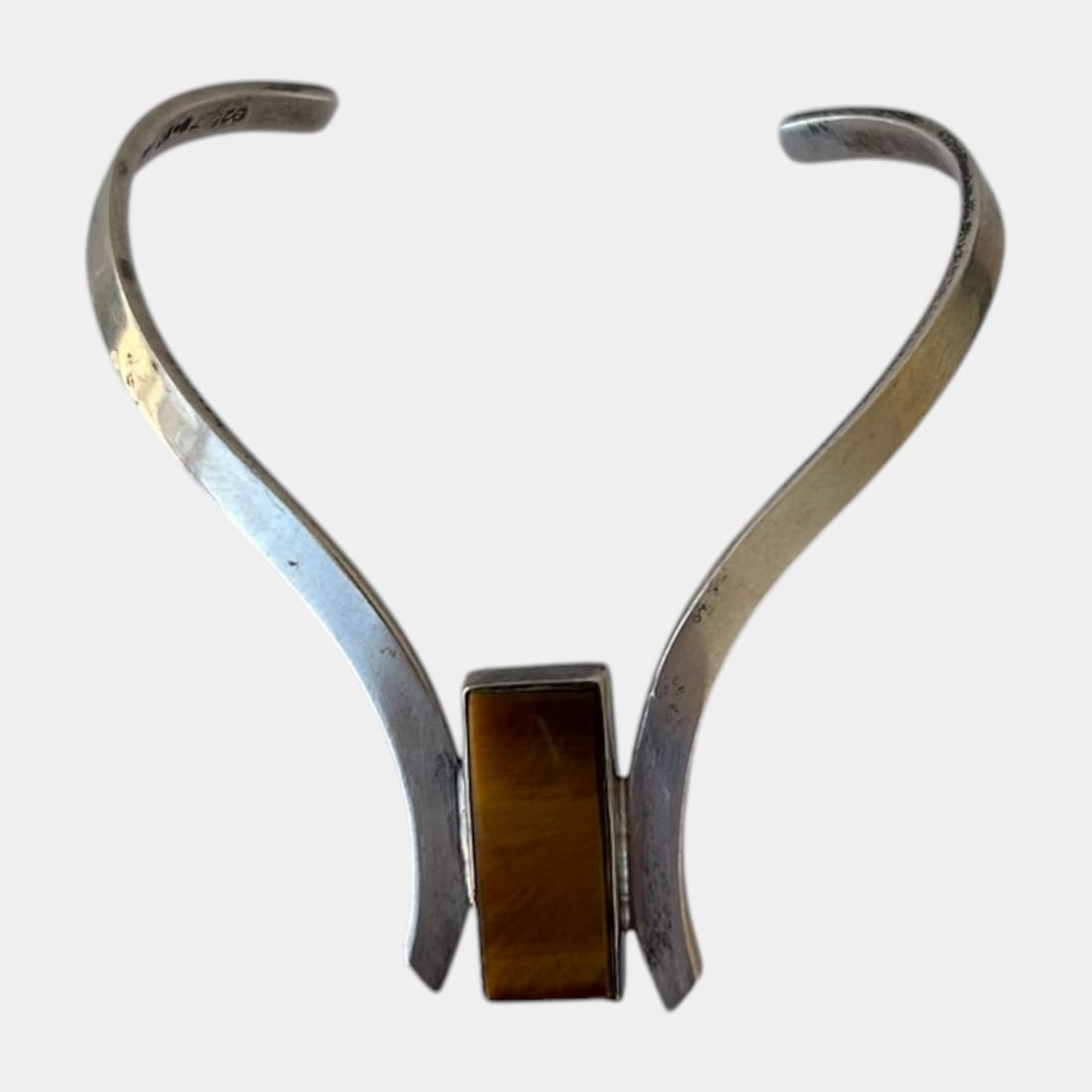 Taxco Mexico Sterling Silver 925 Tiger's Eye Mid Century Modernist Collar Necklace: Professional, fast, and affordable in house shipping available for all items.For higher resolution images please visit www.bid.craftedauctions.com Strikingly modern, this Taxco sterling silver collar 