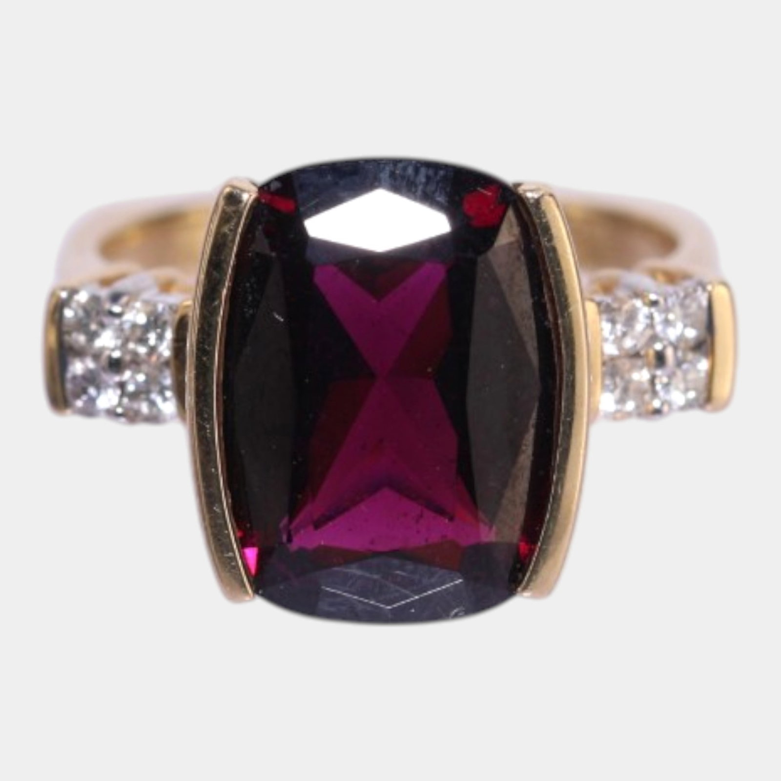 Rhodalite Garnet, 14K Yellow Gold, & Diamond Accents Modernist Statement Ring Size 7: Professional, fast, and affordable in house shipping available for all items.For higher resolution images please visit www.bid.craftedauctions.com Boldly elegant and richly faceted, this 14K gold stat