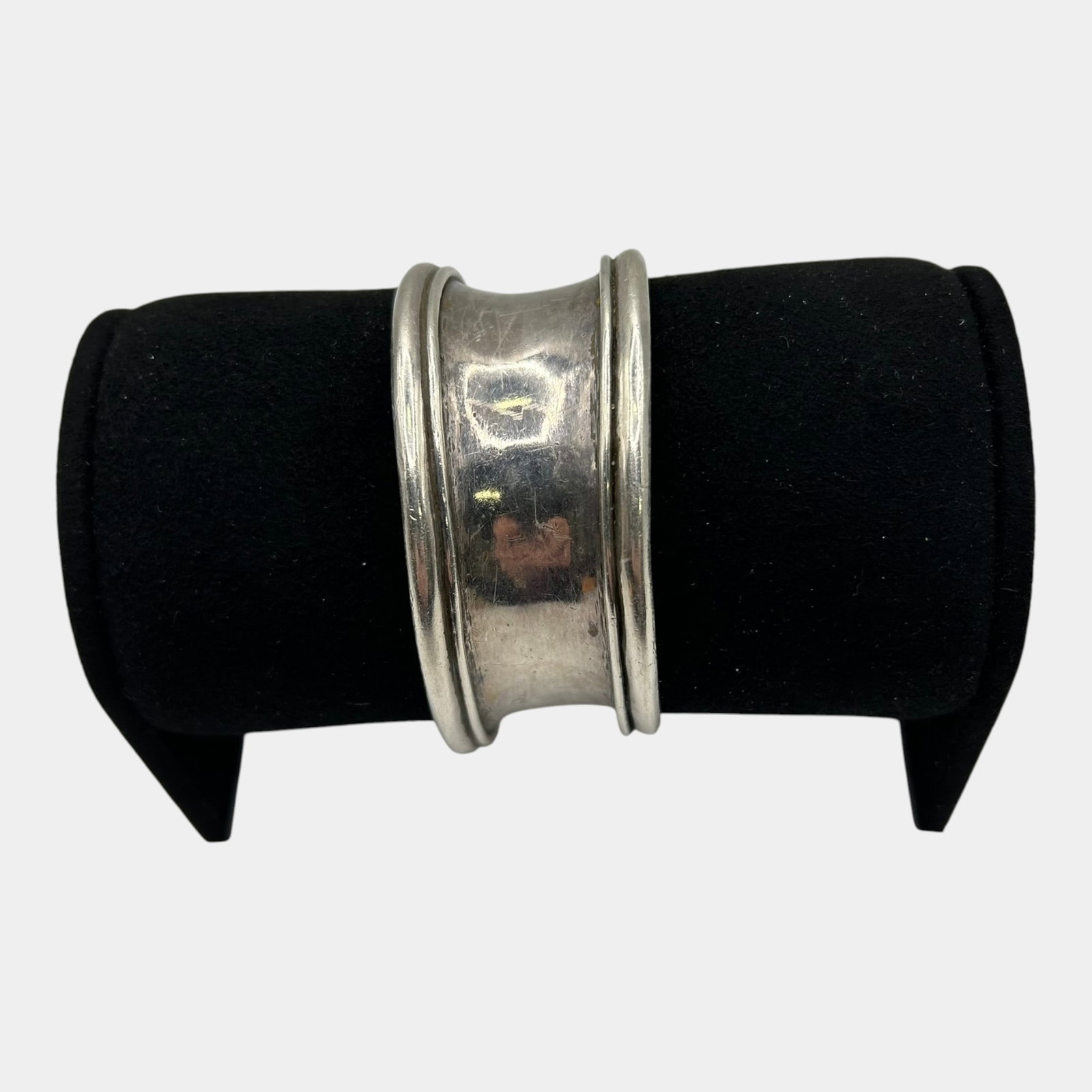 Taxco Mexico Sterling Silver 925 Wide Banded Mid Century Modernist Cuff Bracelet: Professional, fast, and affordable in house shipping available for all items.For higher resolution images please visit www.bid.craftedauctions.com Boldly understated, this vintage sterling silver cuff