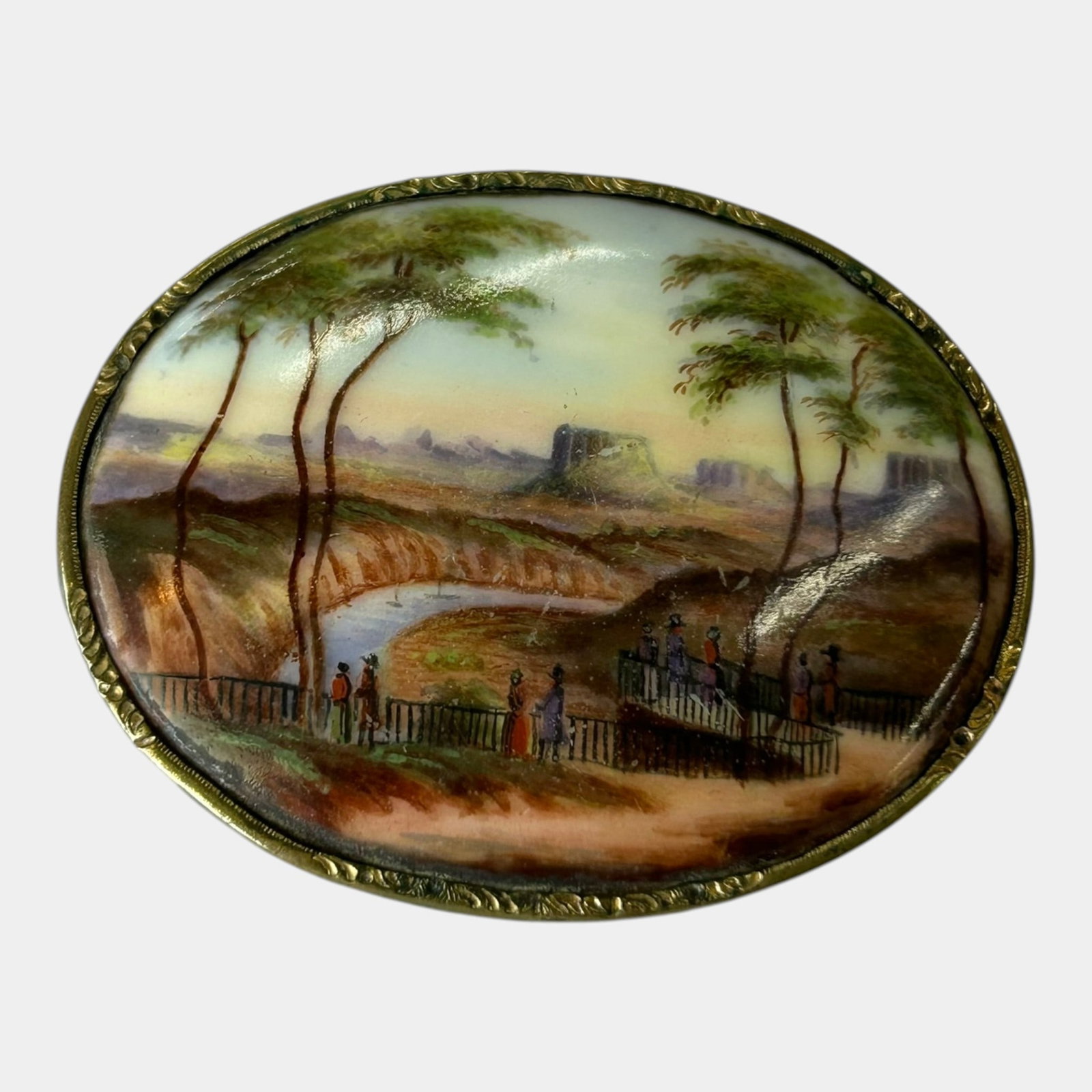 Early 20th Century Hand Painted Porcelain Plaque Scenic Landscape Brooch Pin: Professional, fast, and affordable in house shipping available for all items.For higher resolution images please visit www.bid.craftedauctions.com Excellent condition. Age related wear. Item is 1 1/2"