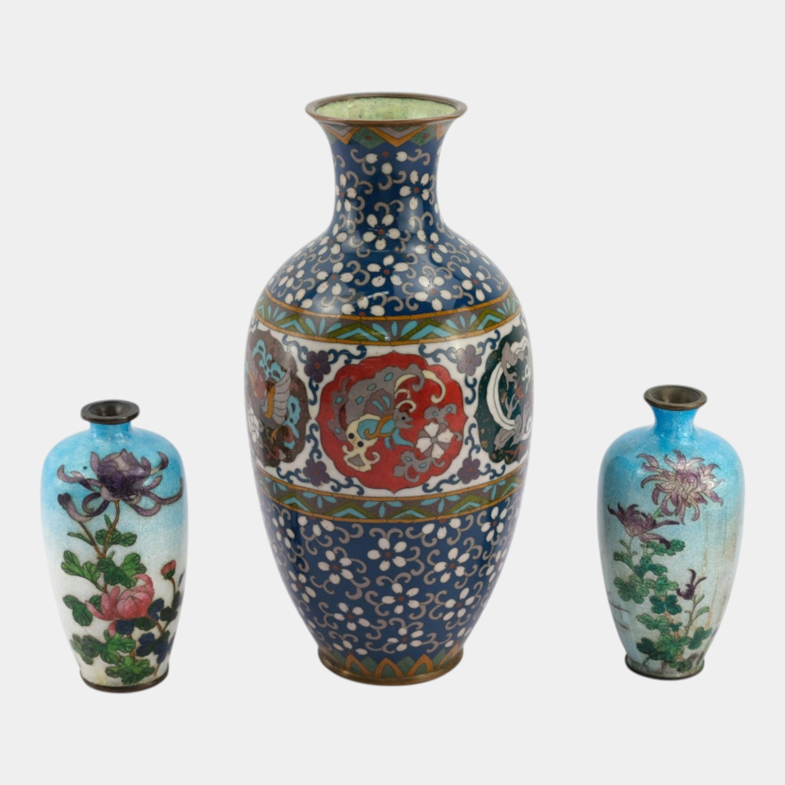 Japanese Cloisonne Meiji Period Ginbari Bronze Blue Floral And Animal Decorated Panel Vases: Professional, fast, and affordable in house shipping available for all items.For higher resolution images please visit www.bid.craftedauctions.com Japanese Cloisonne Meiji Period Ginbari Bronze Blue F