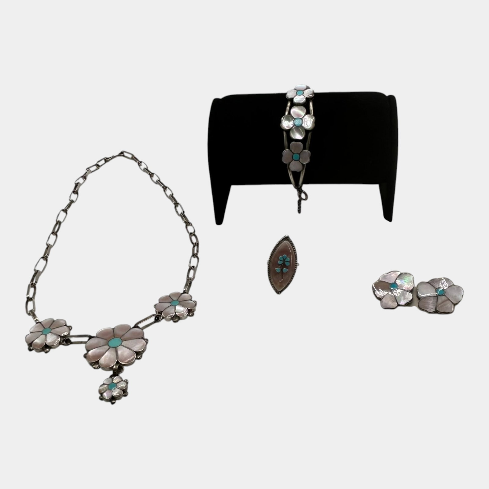 Milton Lasiloo & Other Zuni Native American Sterling Silver Inlay Necklace, Bracelet, Ring & Earring: Professional, fast, and affordable in house shipping available for all items.For higher resolution images please visit www.bid.craftedauctions.com Finely crafted, this Zuni sterling silver jewelry lot