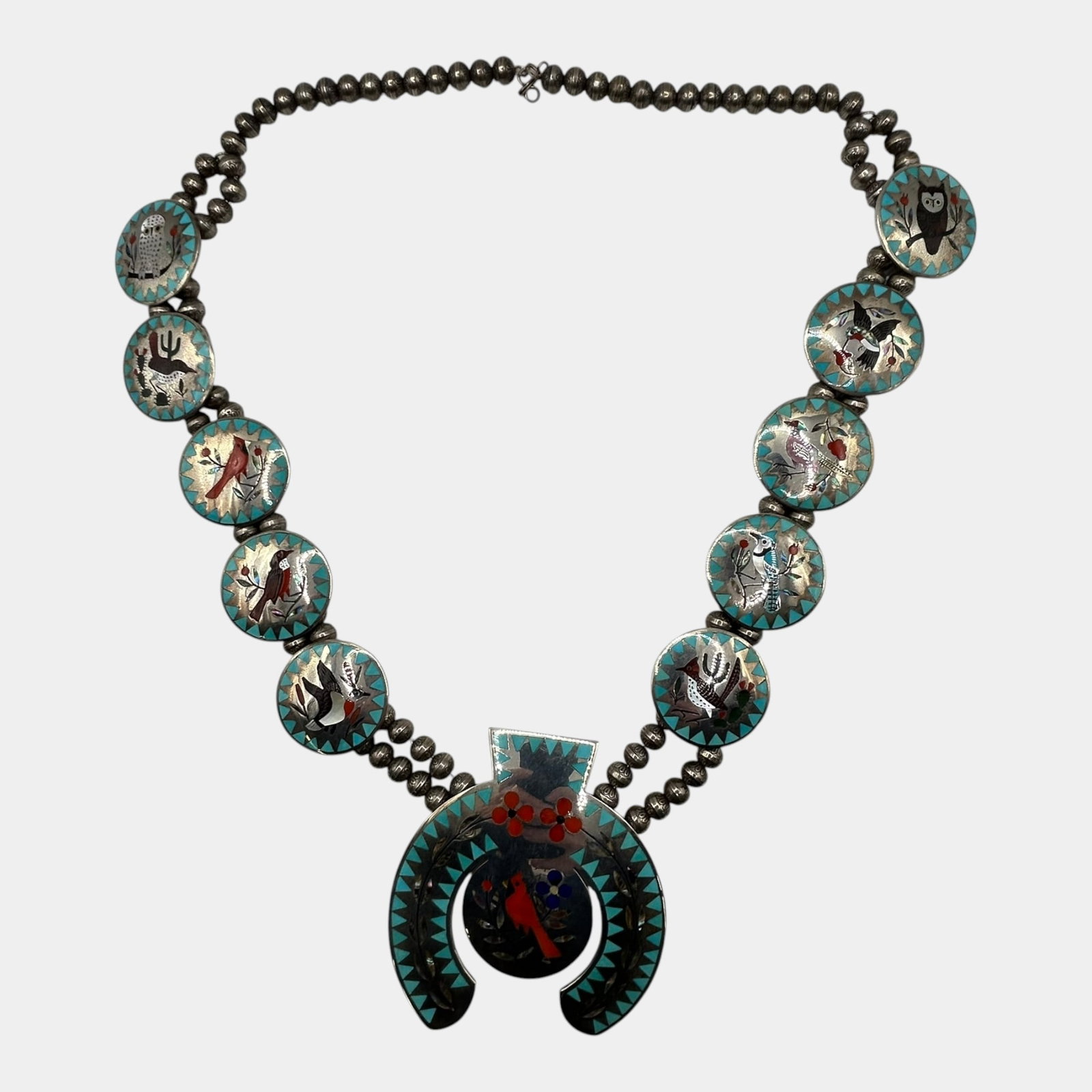 Dennis & Nancy Edaakie Zuni Native American Sterling Cardinal & Other Bird Inlay Squash Blossom: Professional, fast, and affordable in house shipping available for all items.For higher resolution images please visit www.bid.craftedauctions.com Exquisitely crafted, this Dennis & Nancy Edaakie Zuni