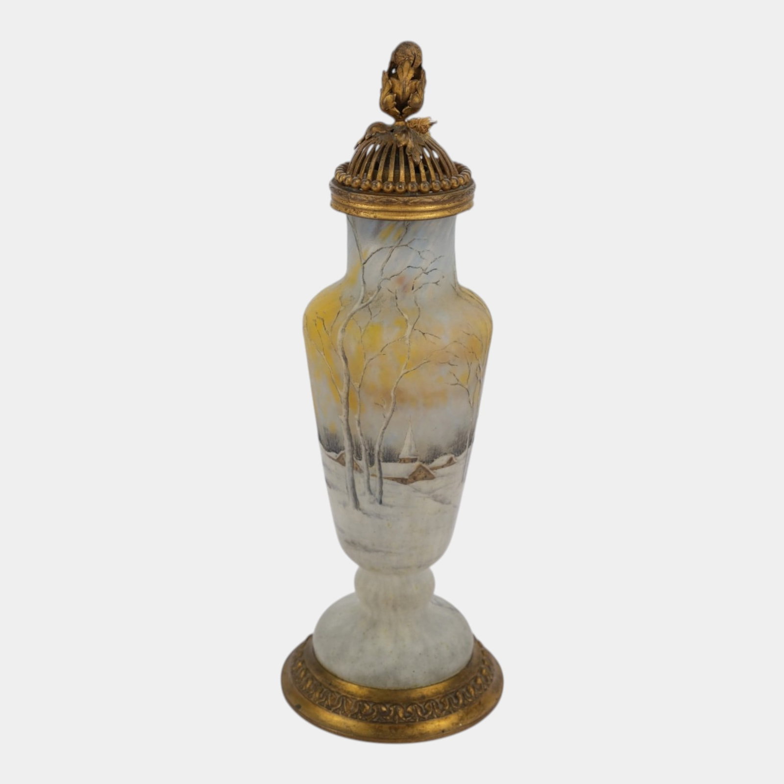 Daum Nancy Early 20th Century French White Art Glass Enameled Dutch Winter Scenic Vase On Pedestal: Professional, fast, and affordable in house shipping available for all items.For higher resolution images please visit www.bid.craftedauctions.com Daum Nancy Early 20th Century French White Art Glass 