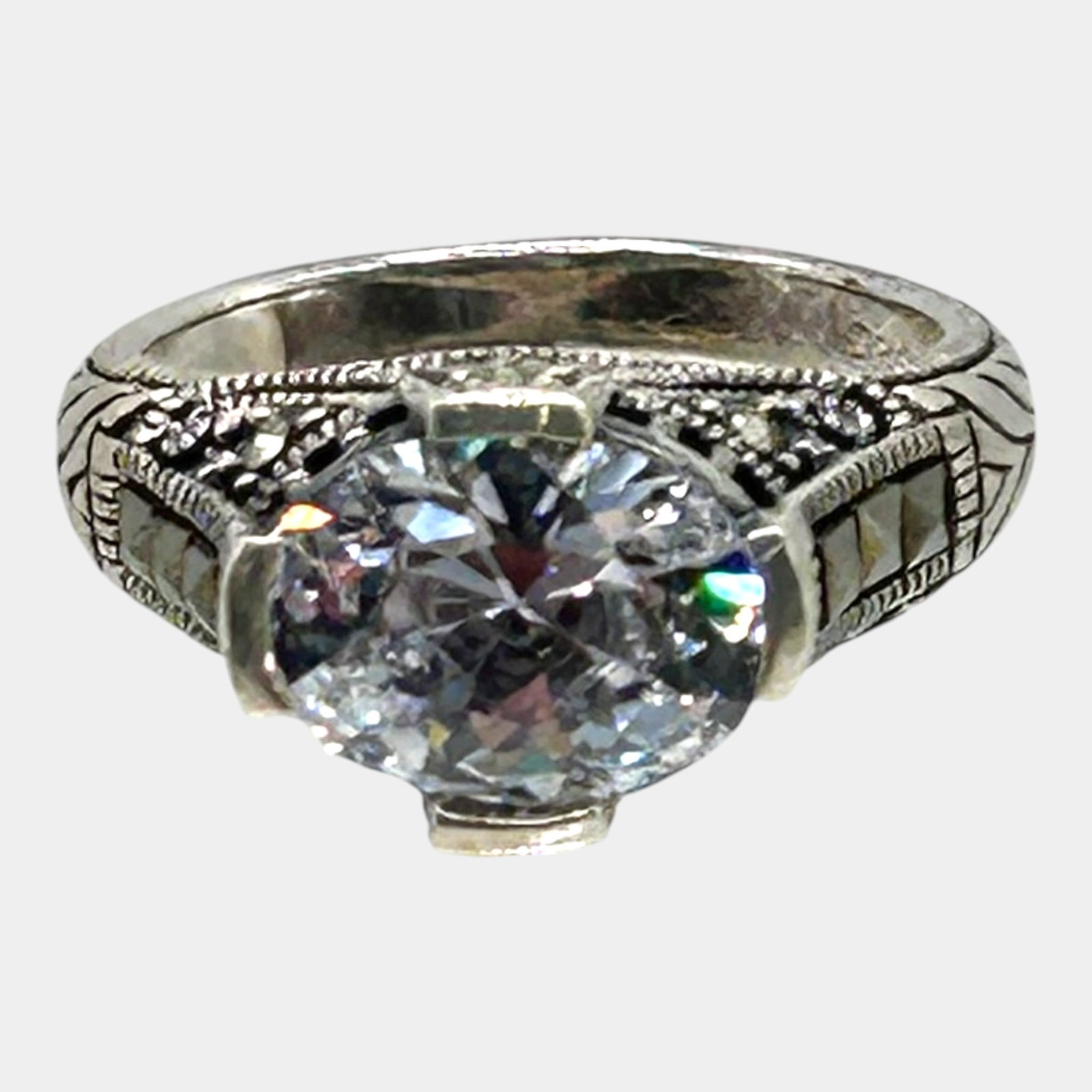 Sterling Silver Cubic Zirconia Solitaire Ring Marcasite Accented Vintage Style Band Ring Size 5.25: Professional, fast, and affordable in house shipping available for all items.For higher resolution images please visit bid.craftedauctions.com A brilliant round cubic zirconia crowns this sterling sil