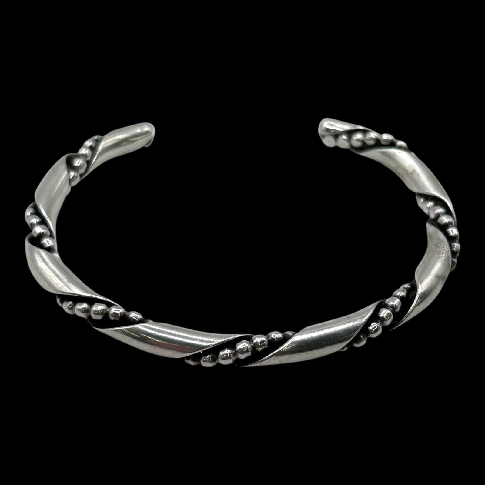 Mid Century Modern Sterling Silver Twisted Ribbon Rope & Beaded Torque Style Cuff Bracelet: Professional, fast, and affordable in house shipping available for all items.For higher resolution images please visit bid.craftedauctions.com Sculptural Mid Century Modern sterling silver open cuff b