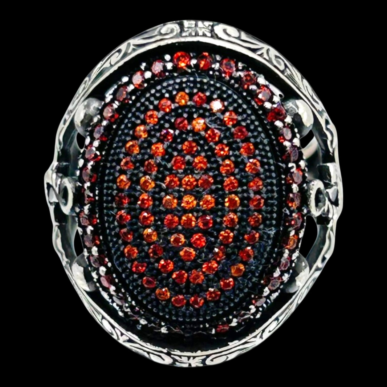 Sterling Silver Garnet Cluster Ring With Anchor Motifs And Openwork Scroll Gallery Design: Professional, fast, and affordable in house shipping available for all items.For higher resolution images please visit bid.craftedauctions.com Distinctively detailed, this sterling silver ring feature