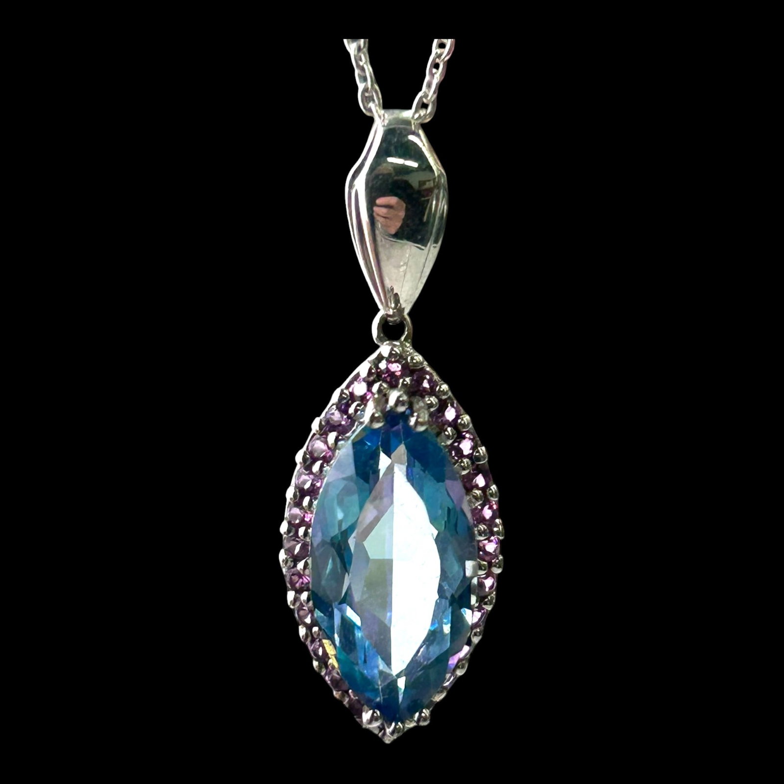 Sterling Silver Blue Mystic Topaz & Pink Gemstone Halo Pendant Necklace Marquise Statement: Professional, fast, and affordable in house shipping available for all items.For higher resolution images please visit bid.craftedauctions.com Brilliantly elegant, this sterling silver necklace featur