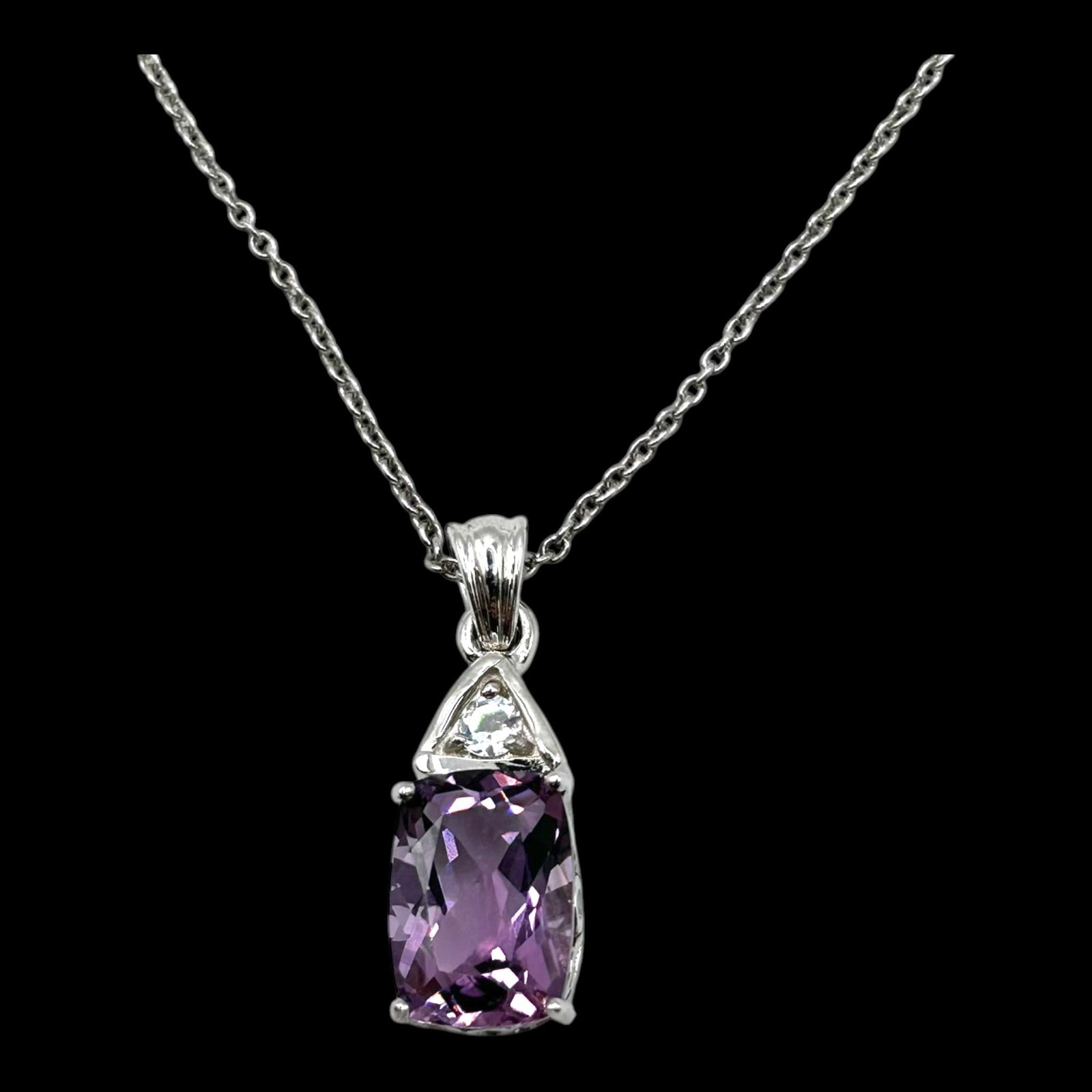 Sterling Silver Amethyst & Accent Stone Pendant Necklace With Emerald Cut Gemstone Design: Professional, fast, and affordable in house shipping available for all items.For higher resolution images please visit bid.craftedauctions.com Elegantly crafted, this sterling silver necklace features