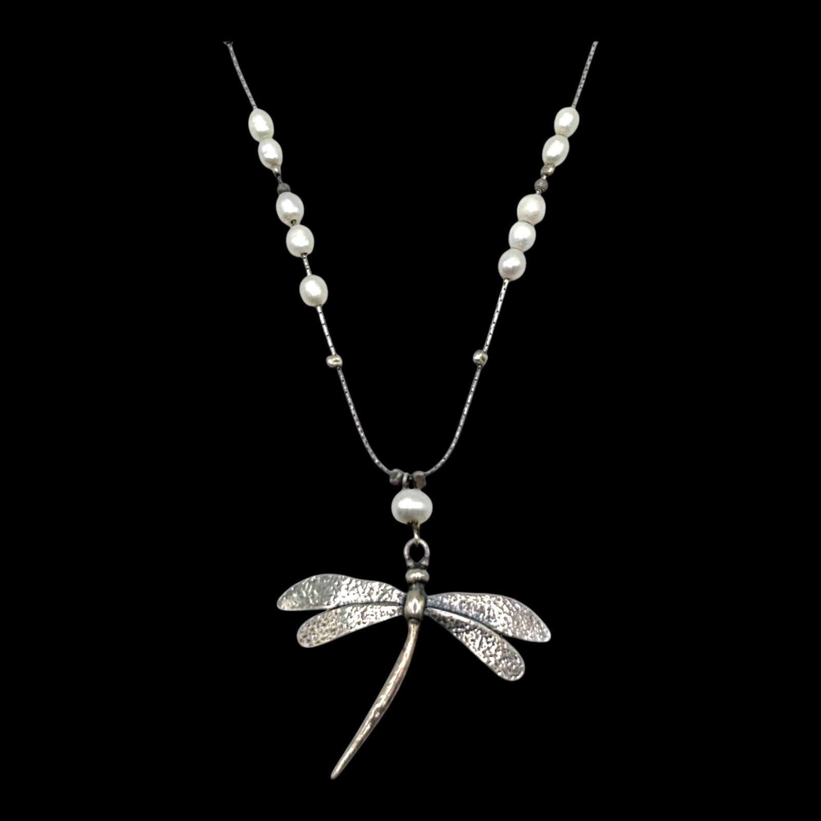 Israel Sterling Silver Dragonfly Pendant Necklace With Freshwater Pearls And Textured Wings Design: Professional, fast, and affordable in house shipping available for all items.For higher resolution images please visit bid.craftedauctions.com Gracefully designed, this sterling silver necklace featur