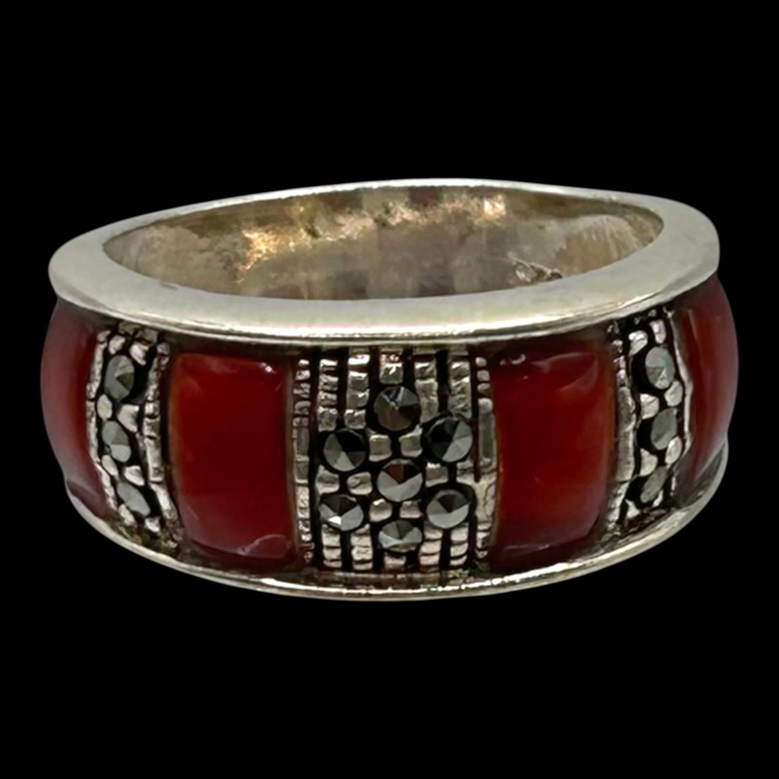 Sterling Silver Carnelian & Marcasite Band Ring With Geometric Panel Art Deco Design: Professional, fast, and affordable in house shipping available for all items.For higher resolution images please visit bid.craftedauctions.com Boldly geometric, this sterling silver band ring features