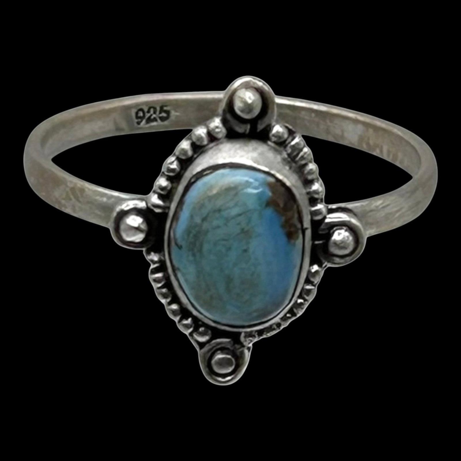 Sterling Silver Oval Turquoise Ring With Beaded Bezel And Four Ball Accent Setting Design: Professional, fast, and affordable in house shipping available for all items.For higher resolution images please visit bid.craftedauctions.com Simply elegant, this sterling silver ring features an ova