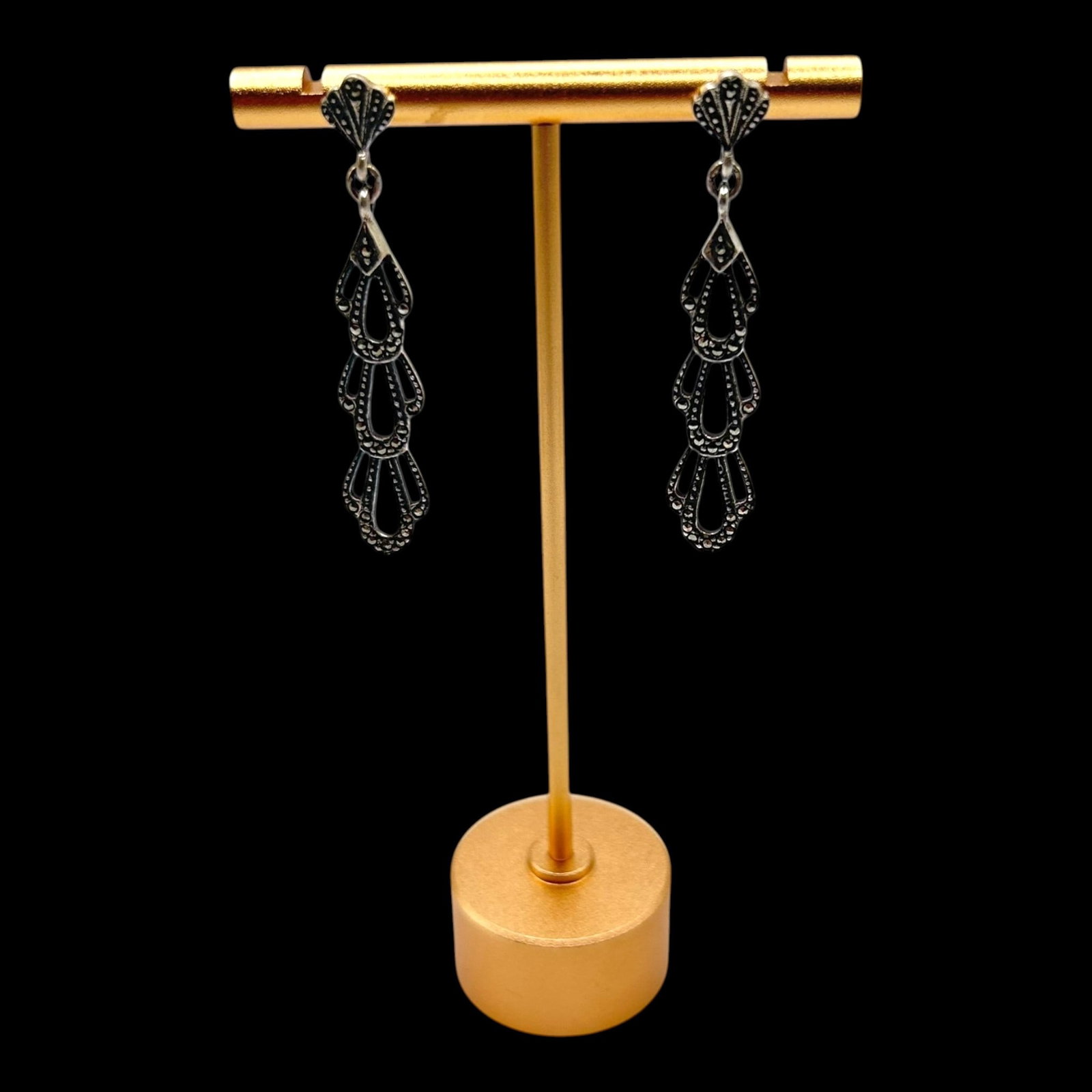 Sterling Silver Marcasite Openwork Dangle Earrings With Art Deco Inspired Drop Design: Professional, fast, and affordable in house shipping available for all items.For higher resolution images please visit bid.craftedauctions.com Elegantly detailed, these sterling silver dangle earrings