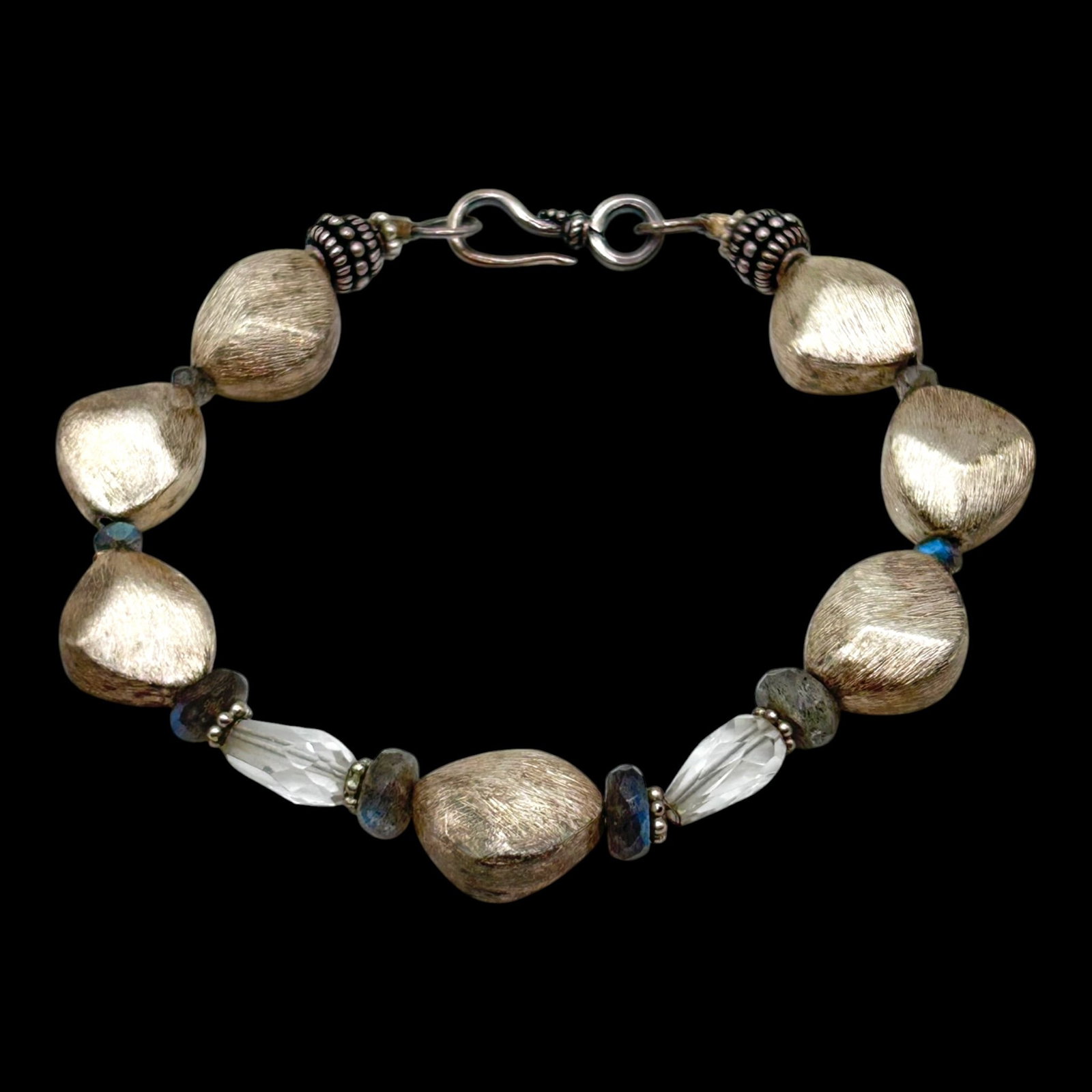 Sterling Silver Brushed Bead Bracelet With Faceted Crystal & Labradorite Accent Beads: Professional, fast, and affordable in house shipping available for all items.For higher resolution images please visit bid.craftedauctions.com Elegantly crafted, this sterling silver bracelet features