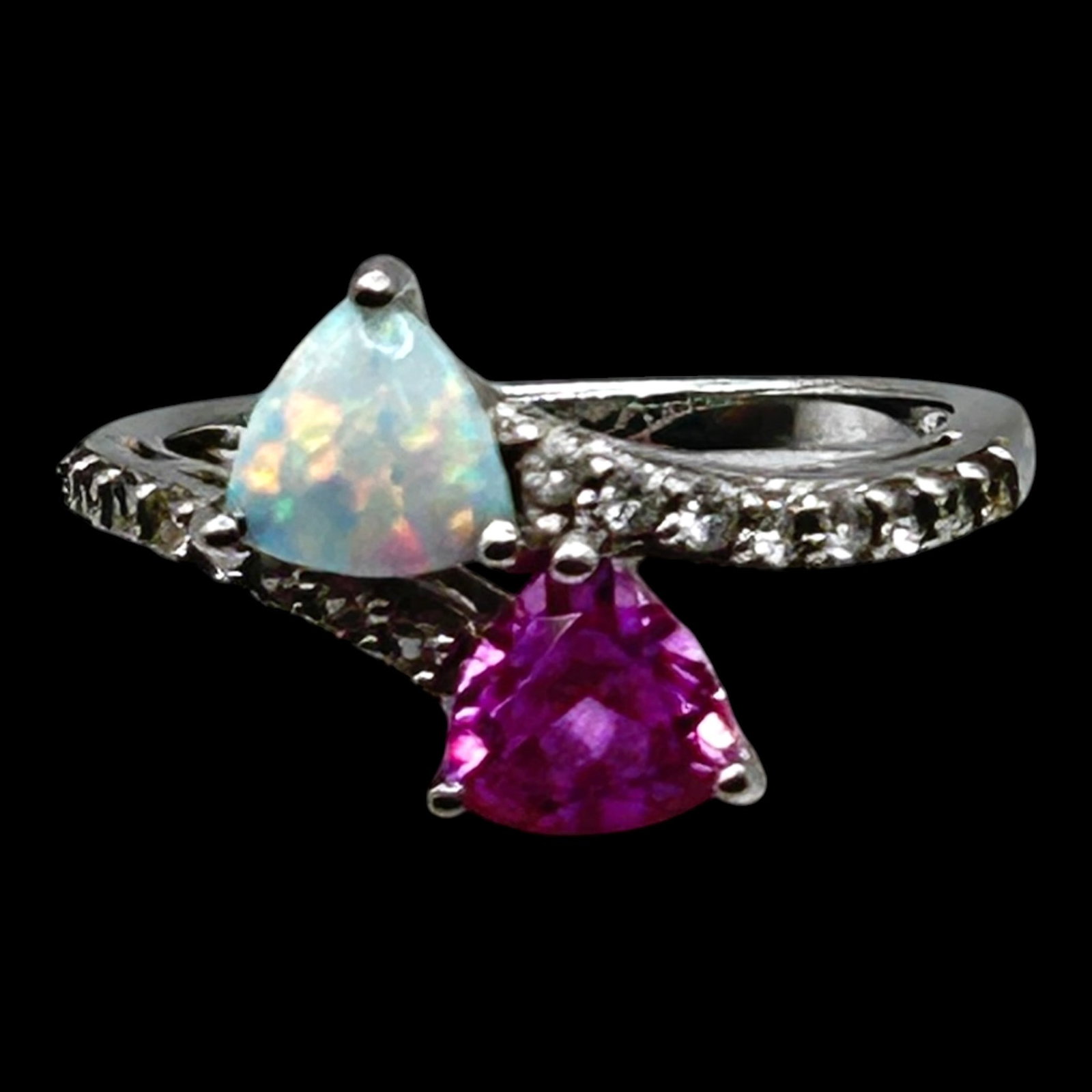 Sterling Silver Trillion Opal & Ruby Ring With Diamond Accent Bypass Statement Design: Professional, fast, and affordable in house shipping available for all items.For higher resolution images please visit bid.craftedauctions.com Elegantly styled, this sterling silver bypass ring featur