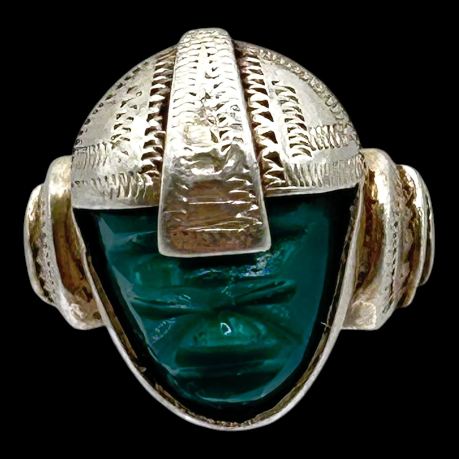 Mexico Sterling Silver Carved Green Stone Pre-Columbian Warrior Ring Figural Statement Design: Professional, fast, and affordable in house shipping available for all items.For higher resolution images please visit bid.craftedauctions.com Boldly crafted in Mexico, this sterling silver ring featu