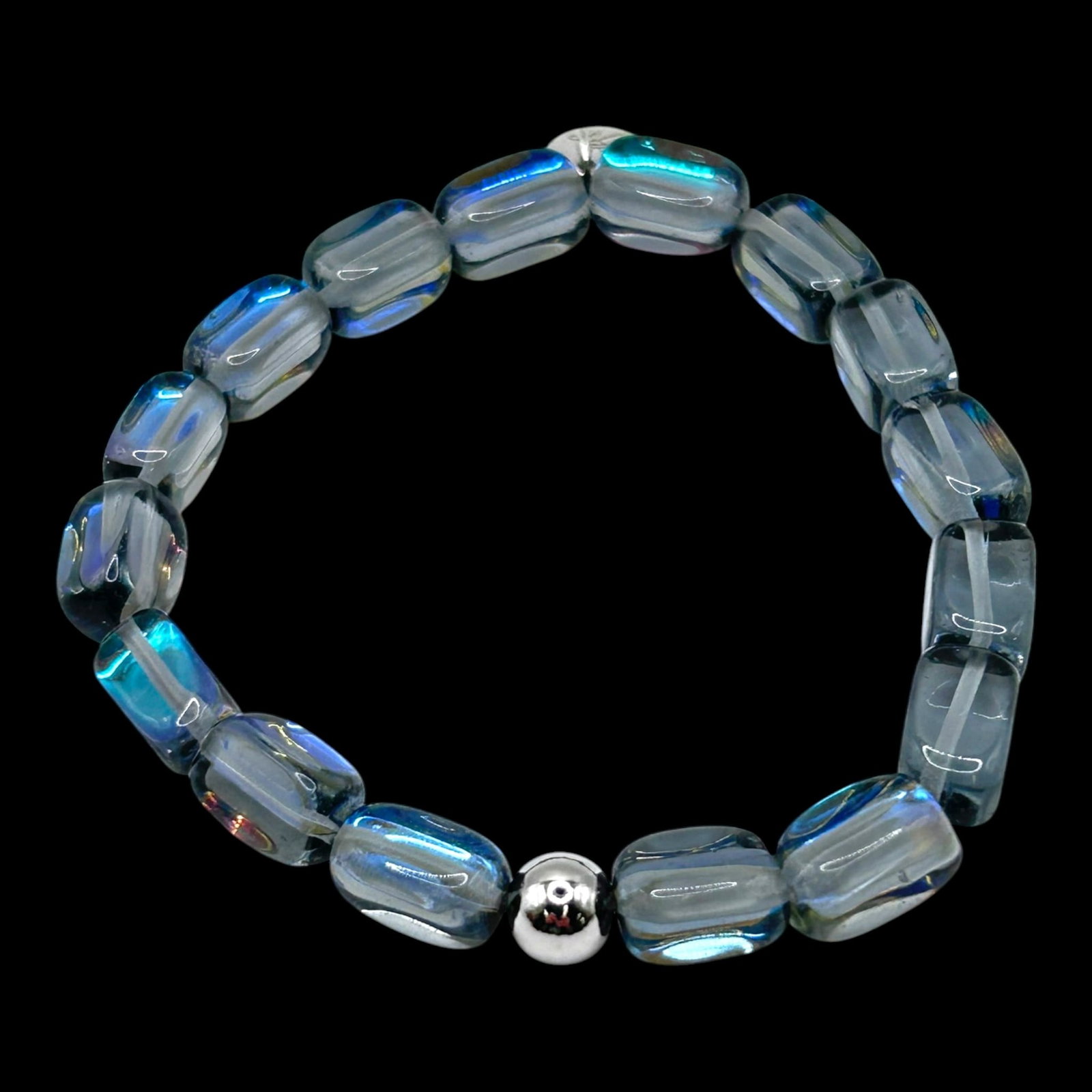 Sterling Silver & Opalescent Glass Bead Stretch Bracelet With Barrel Beads & Ball Accent Design: Professional, fast, and affordable in house shipping available for all items.For higher resolution images please visit bid.craftedauctions.com Elegantly styled, this stretch bracelet features luminous