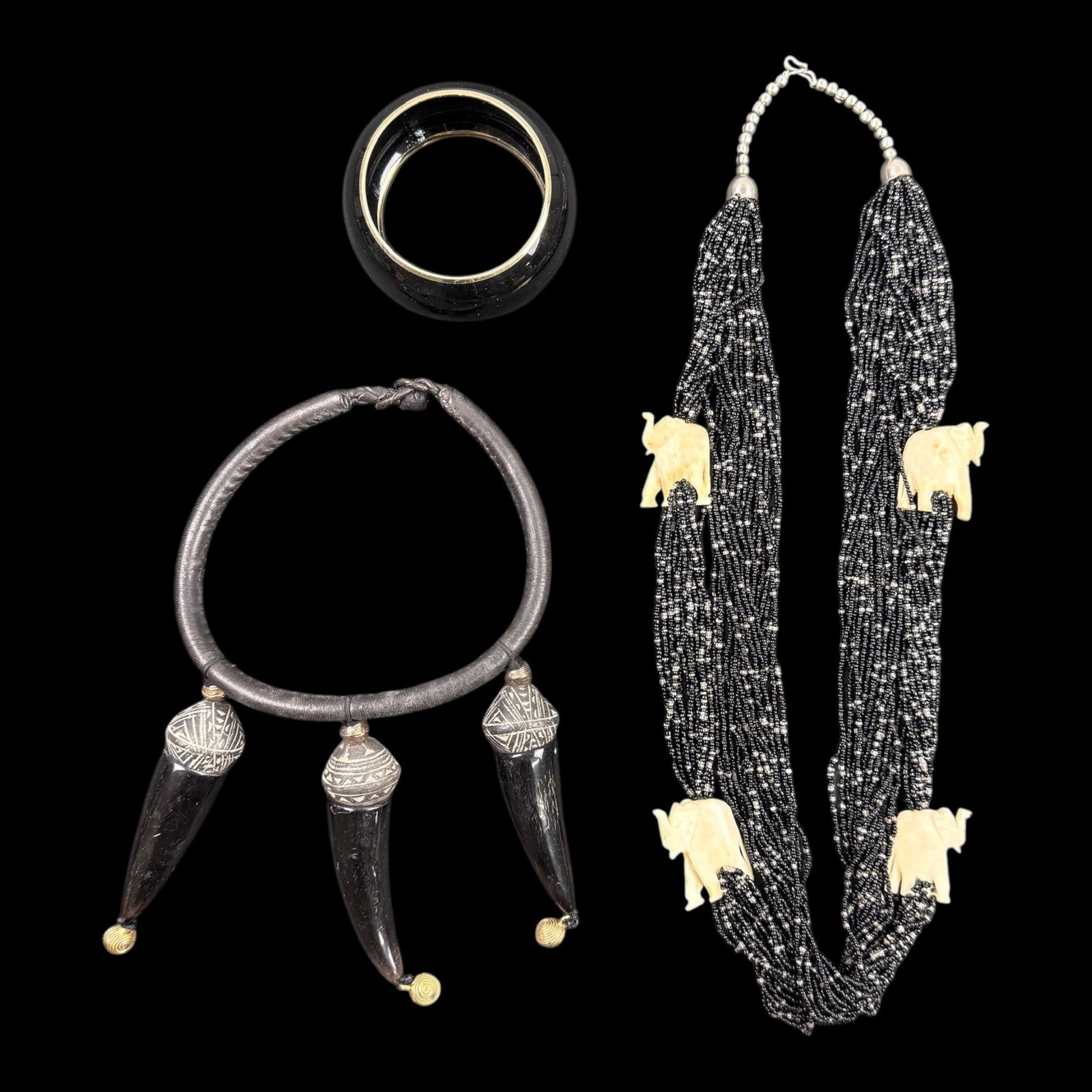 Vintage Tribal Style Jewelry With Horn Collar Necklace Beaded Elephant Necklace & Bangle Cuff: Professional, fast, and affordable in house shipping available for all items.For higher resolution images please visit bid.craftedauctions.com Vintage Tribal Style Jewelry With Horn Collar Necklace Be