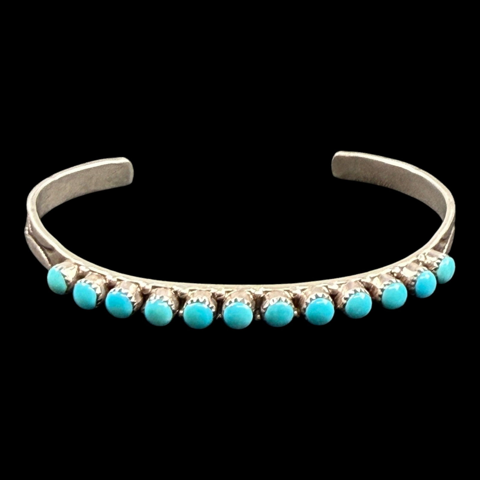Darlene Coonsis Zuni Native American Sterling Silver Petit Point Turquoise Row Cuff Bracelet Signed: Professional, fast, and affordable in house shipping available for all items.For higher resolution images please visit bid.craftedauctions.com Delicately handcrafted Zuni sterling silver cuff bracelet